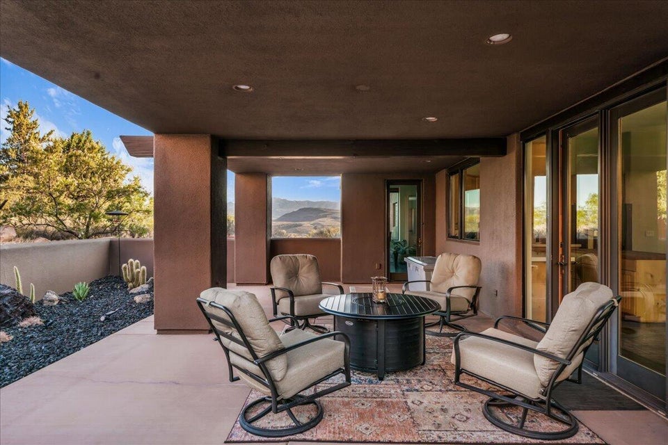 Covered outdoor patio featuring concrete flooring and recessed lighting