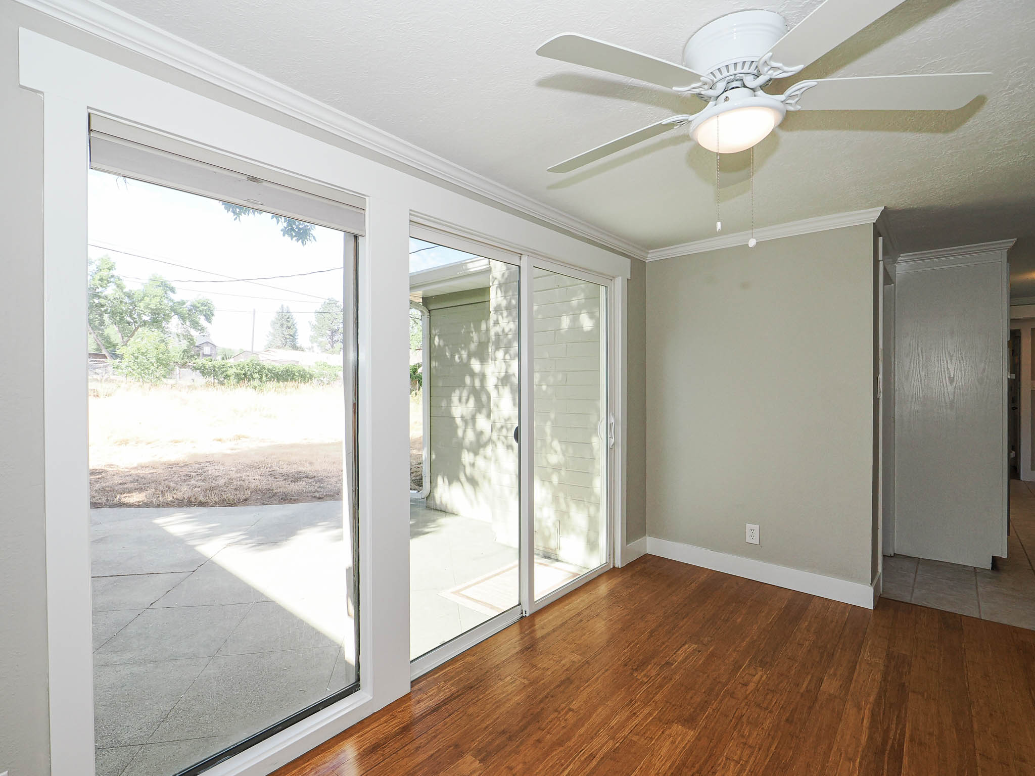 Interior space featuring wood-finish flooring and light gray walls