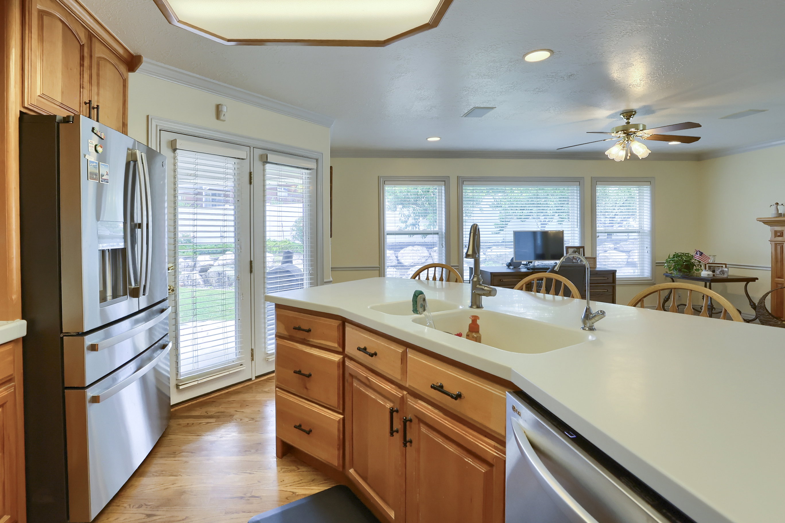 Kitchen island with dual basin sink and gooseneck faucet