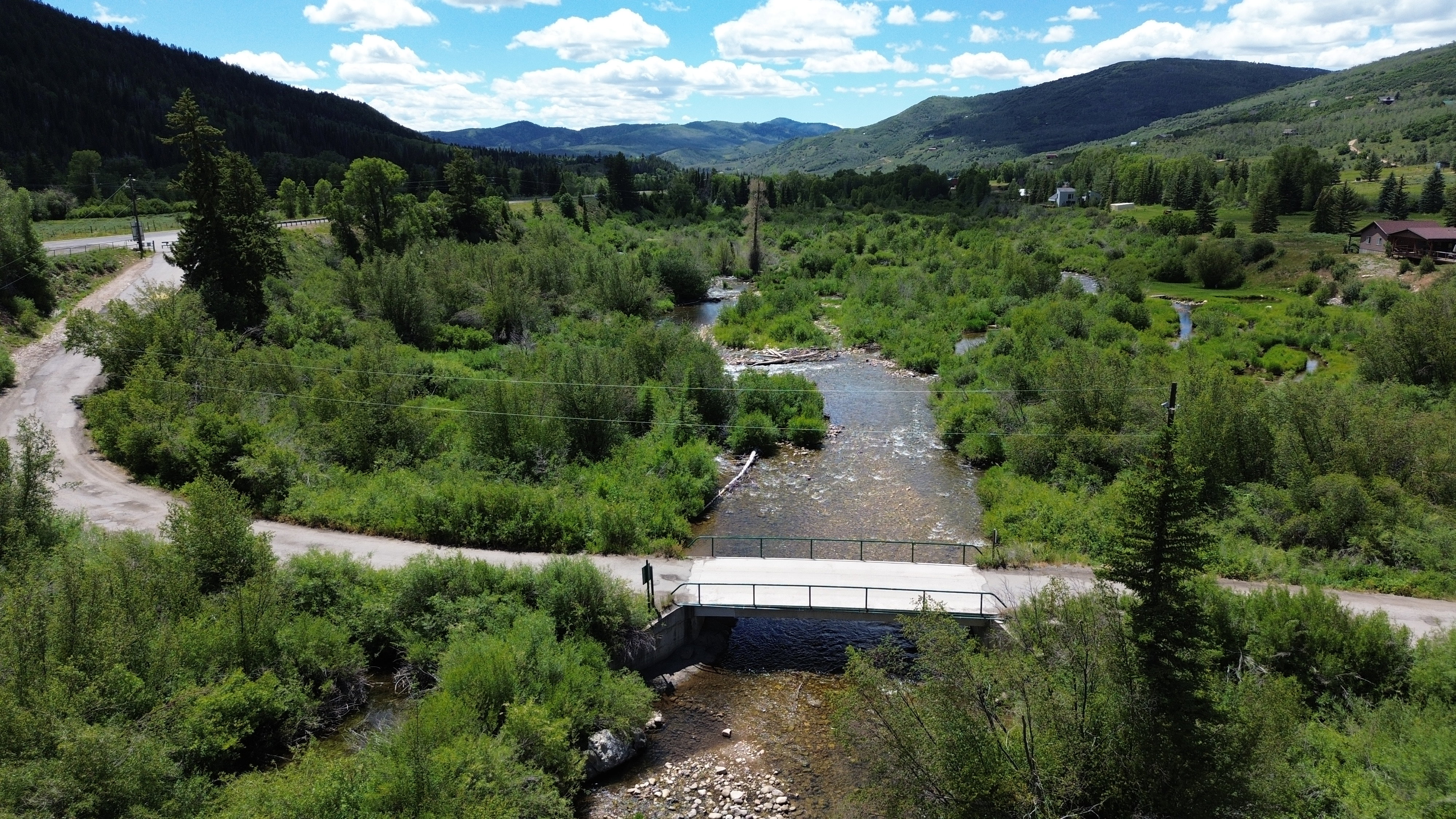 View of the Weber River at bridge at the entry of the subdivision