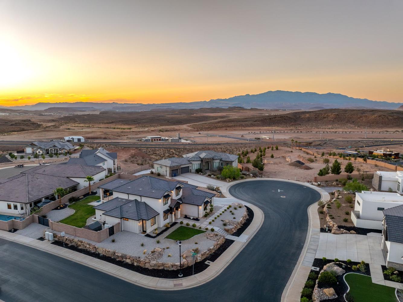 Modern desert-style residence with a contrasting black and white exterior