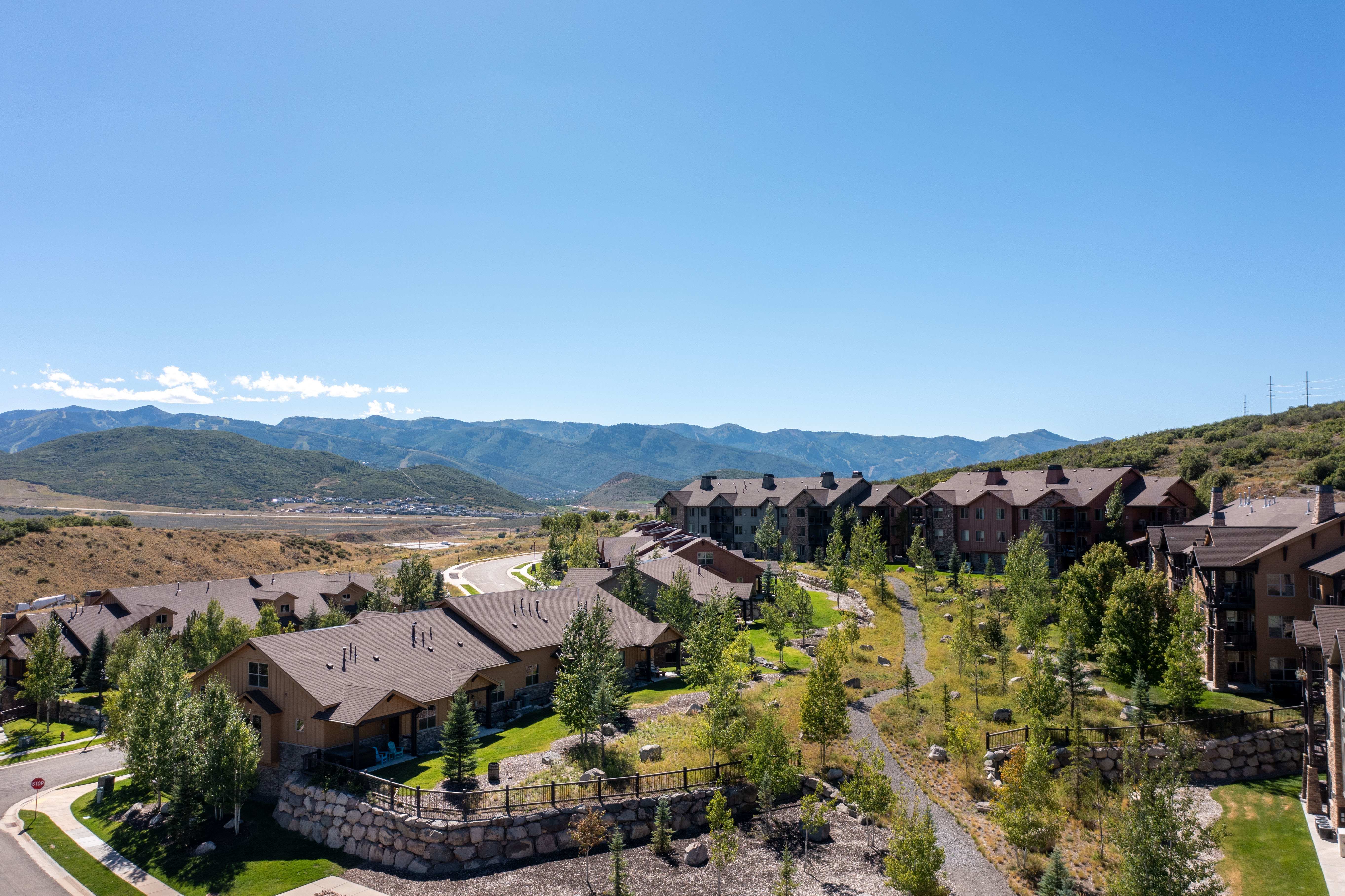 Expansive community featuring multiple residential buildings with varied architectural styles