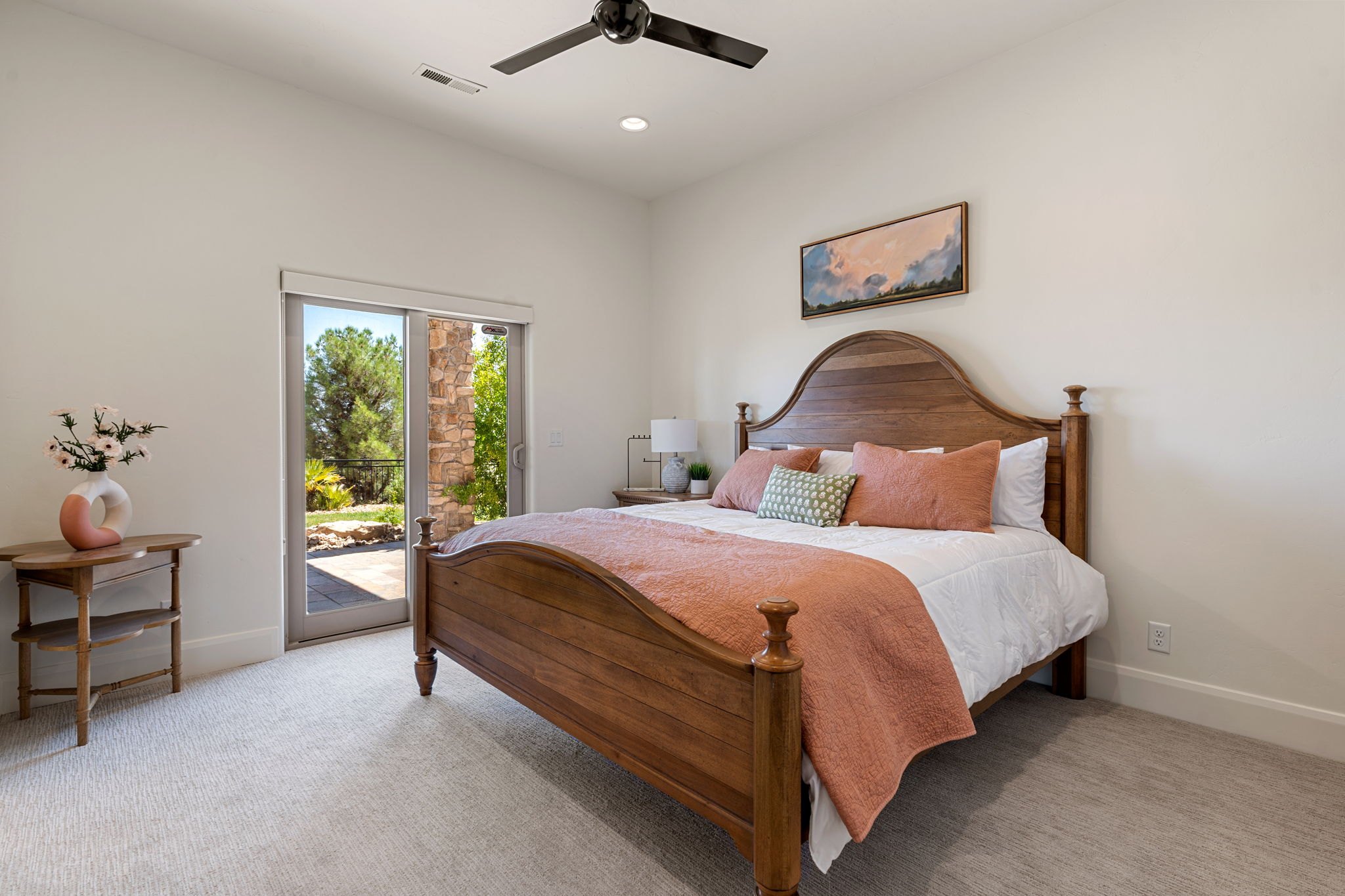 Spacious room with light-toned carpeting and neutral wall tones