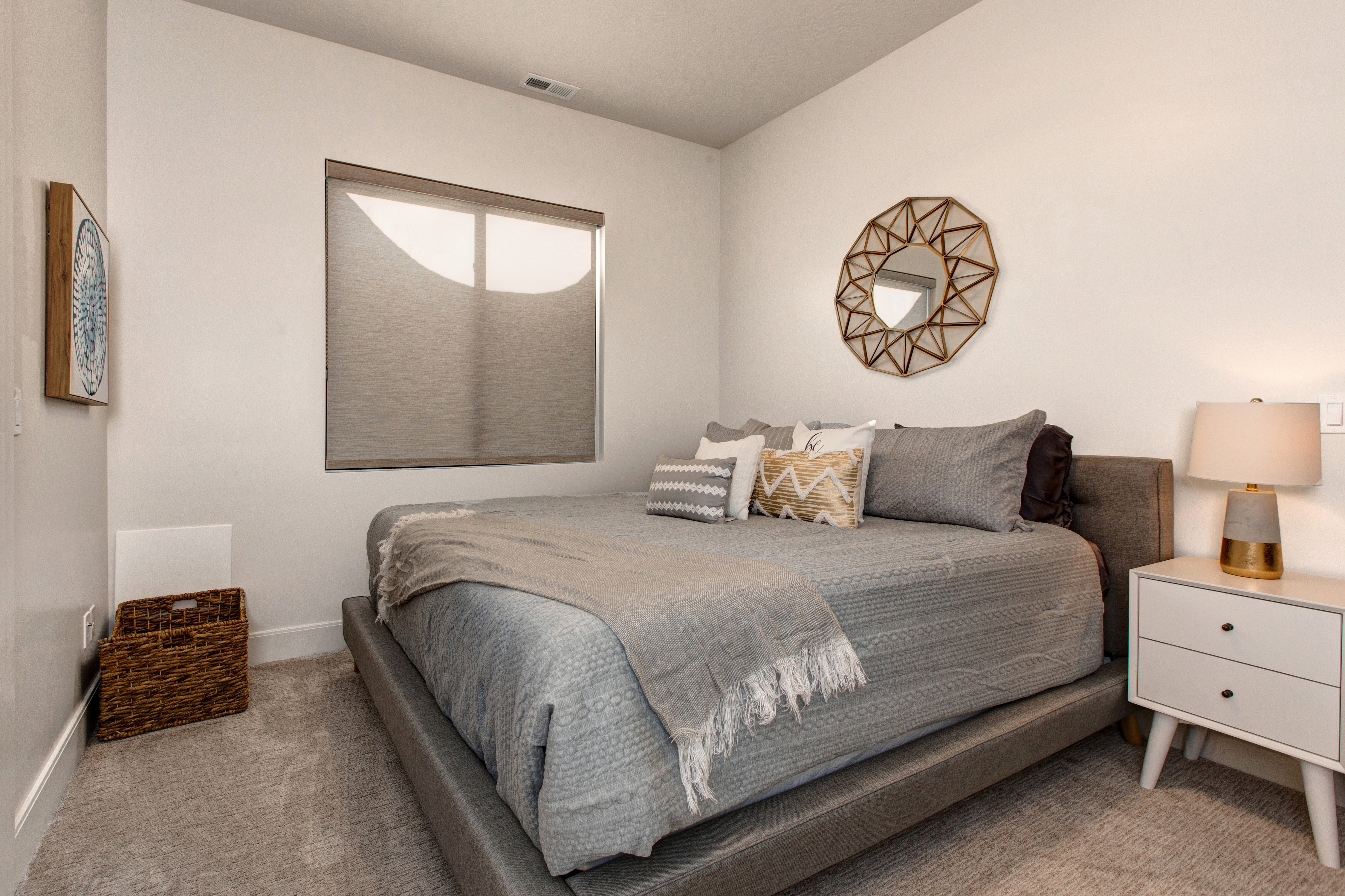 Bedroom featuring light-colored walls and carpet flooring
