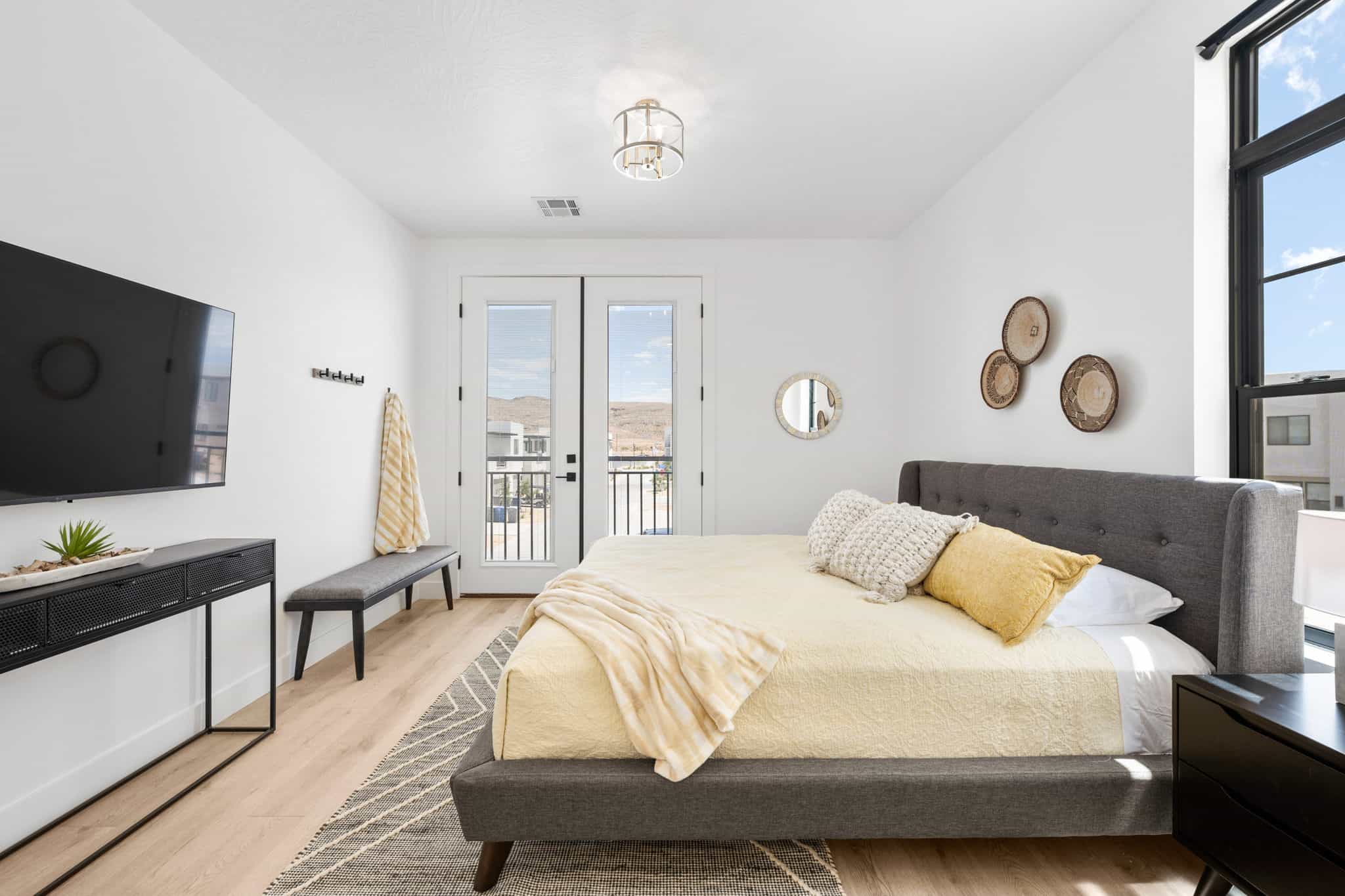 Bright room featuring wood-finish flooring and white walls