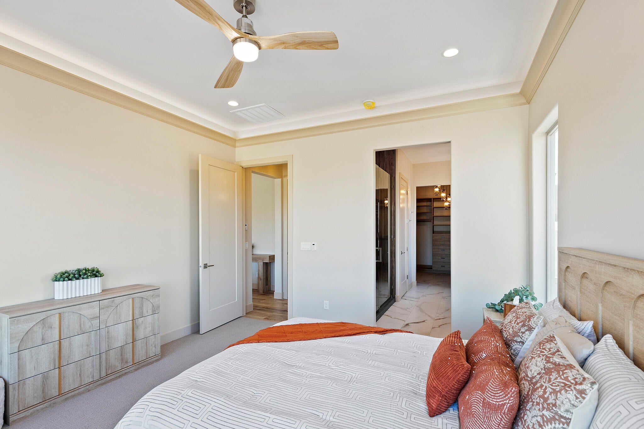 Bedroom featuring crown molding, recessed lighting, and a modern ceiling fan