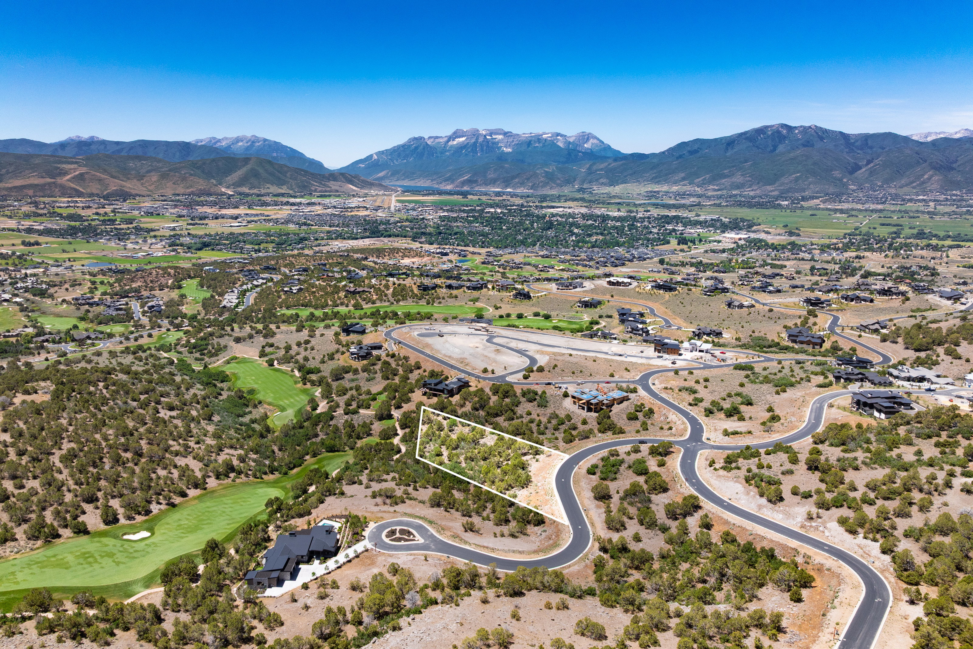 Expansive parcel featuring natural vegetation and surrounding mountain ranges