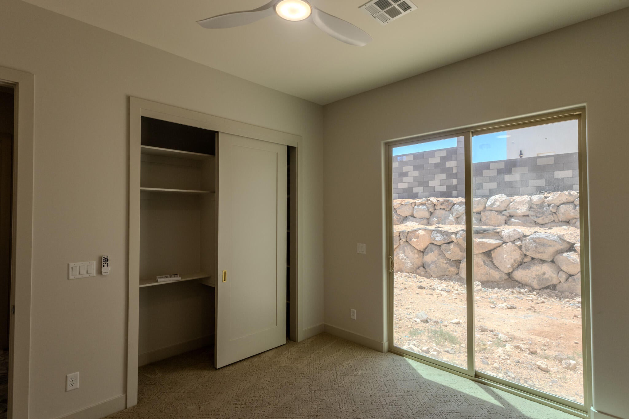 Sliding glass door opening to an exterior space