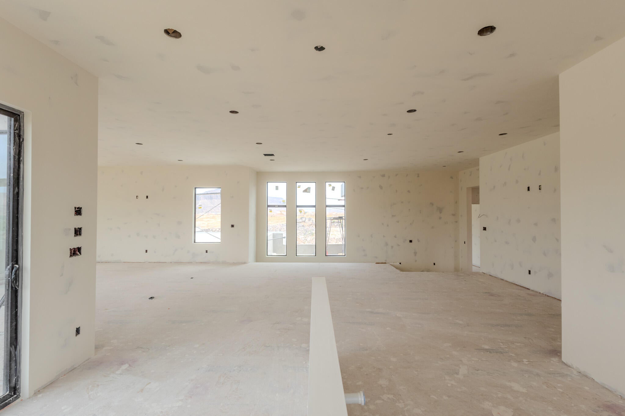 Spacious interior featuring multiple recessed lighting fixtures
