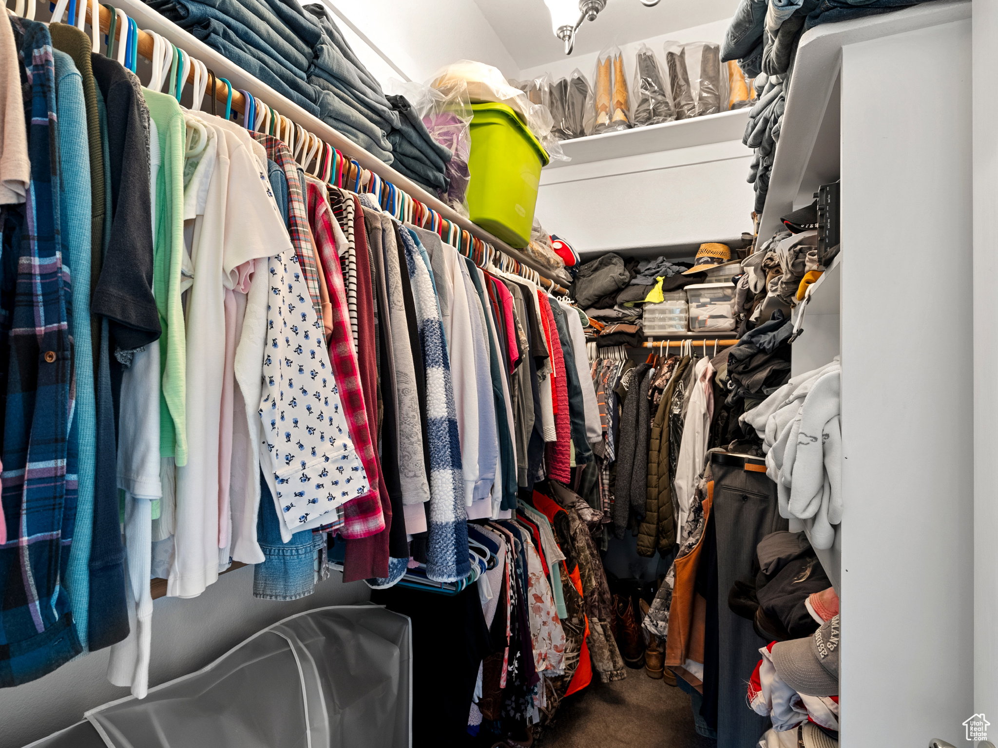 Primary bedroom walk in closet.