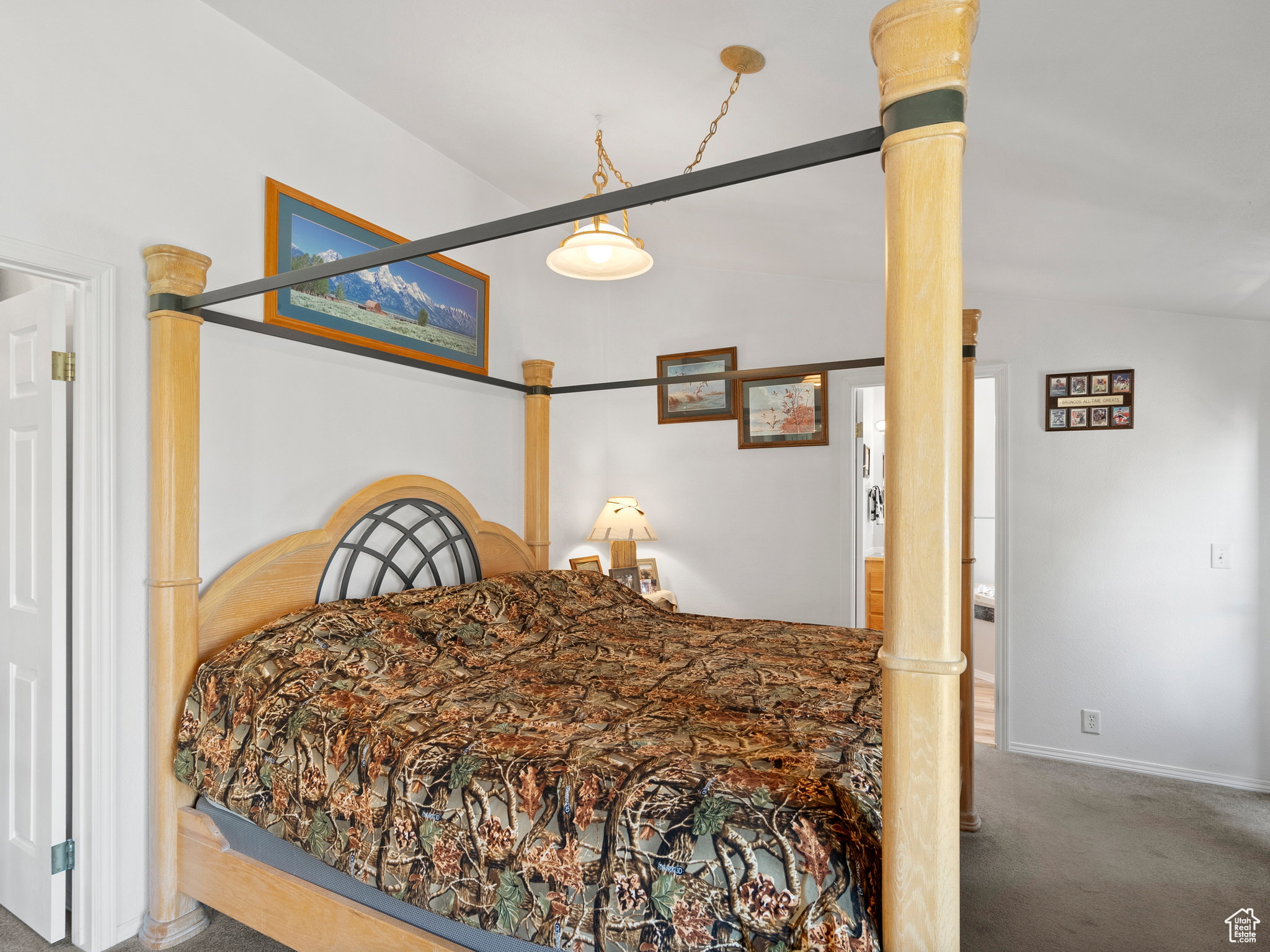 Primary bedroom with vaulted ceilings, walk in closet and on suite bathroom.