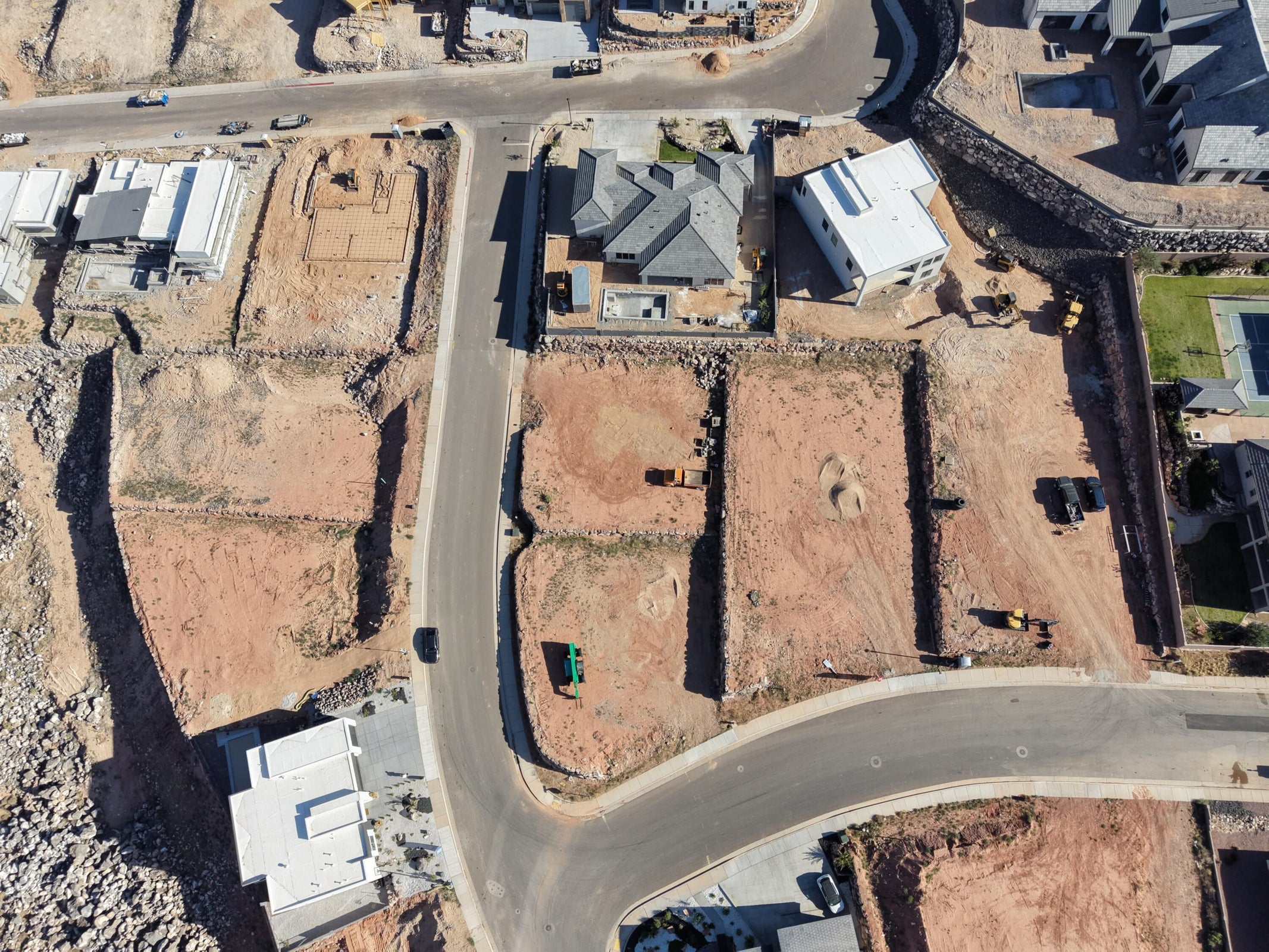 Aerial view showcasing multiple graded building lots
