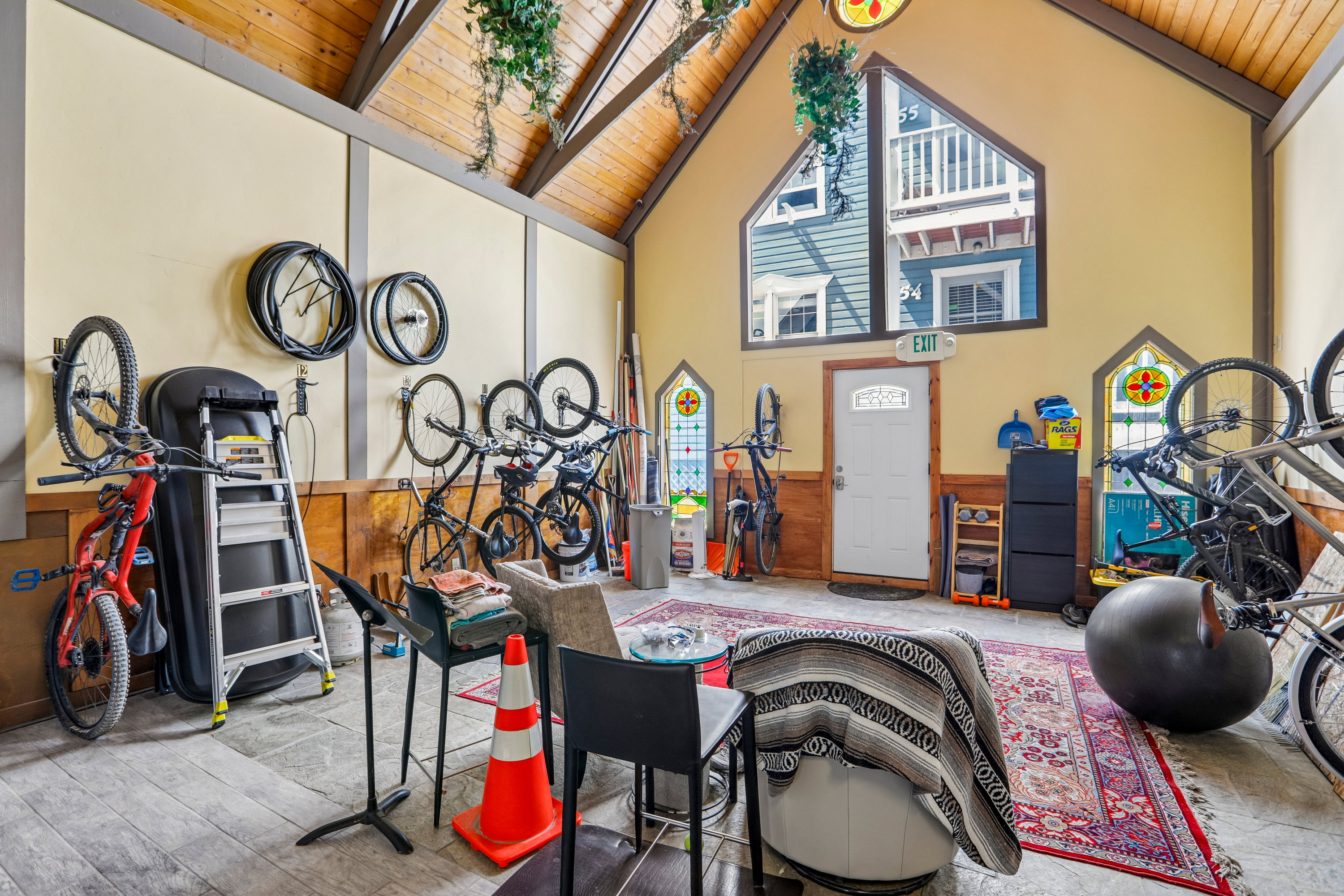 Vaulted wood-paneled ceiling with exposed beams