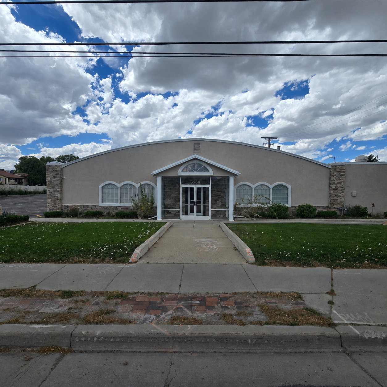 10,950 square foot commerical building - C-2 zoning with Redwood Road frontage.