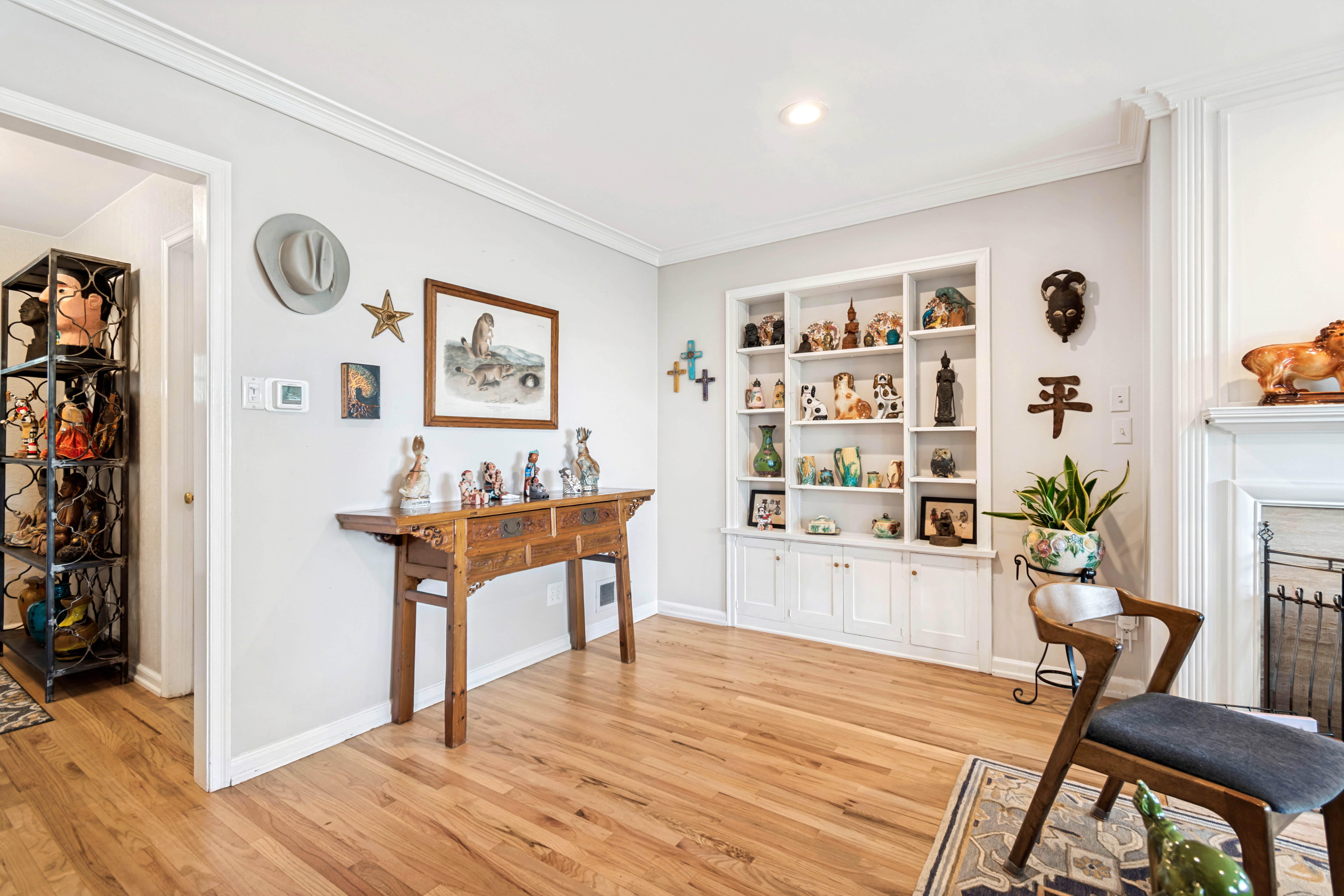 Light wood-finish flooring complements the neutral wall color