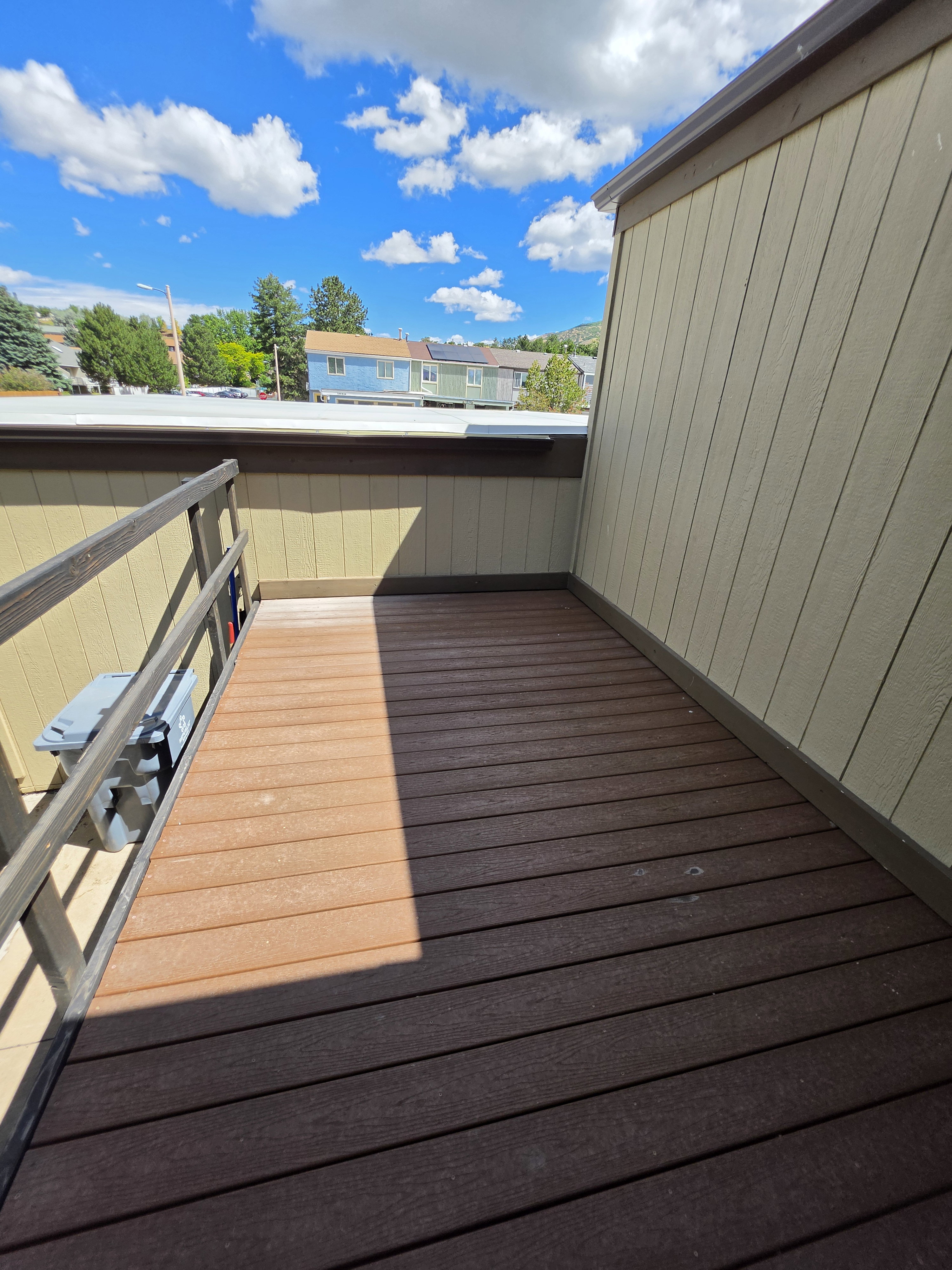 Outdoor balcony with composite decking and railing