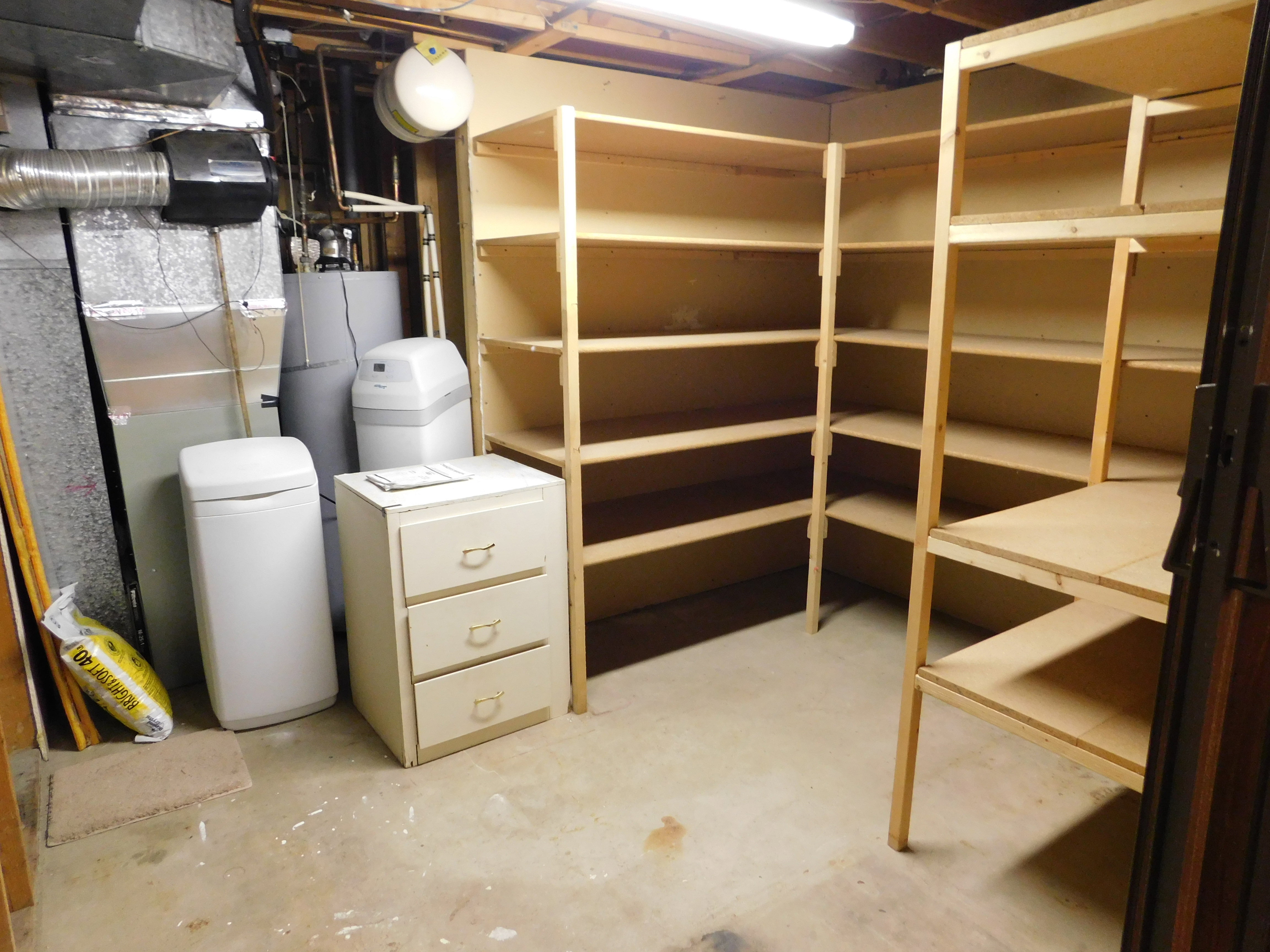 Extensive built-in shelving provides ample storage solutions