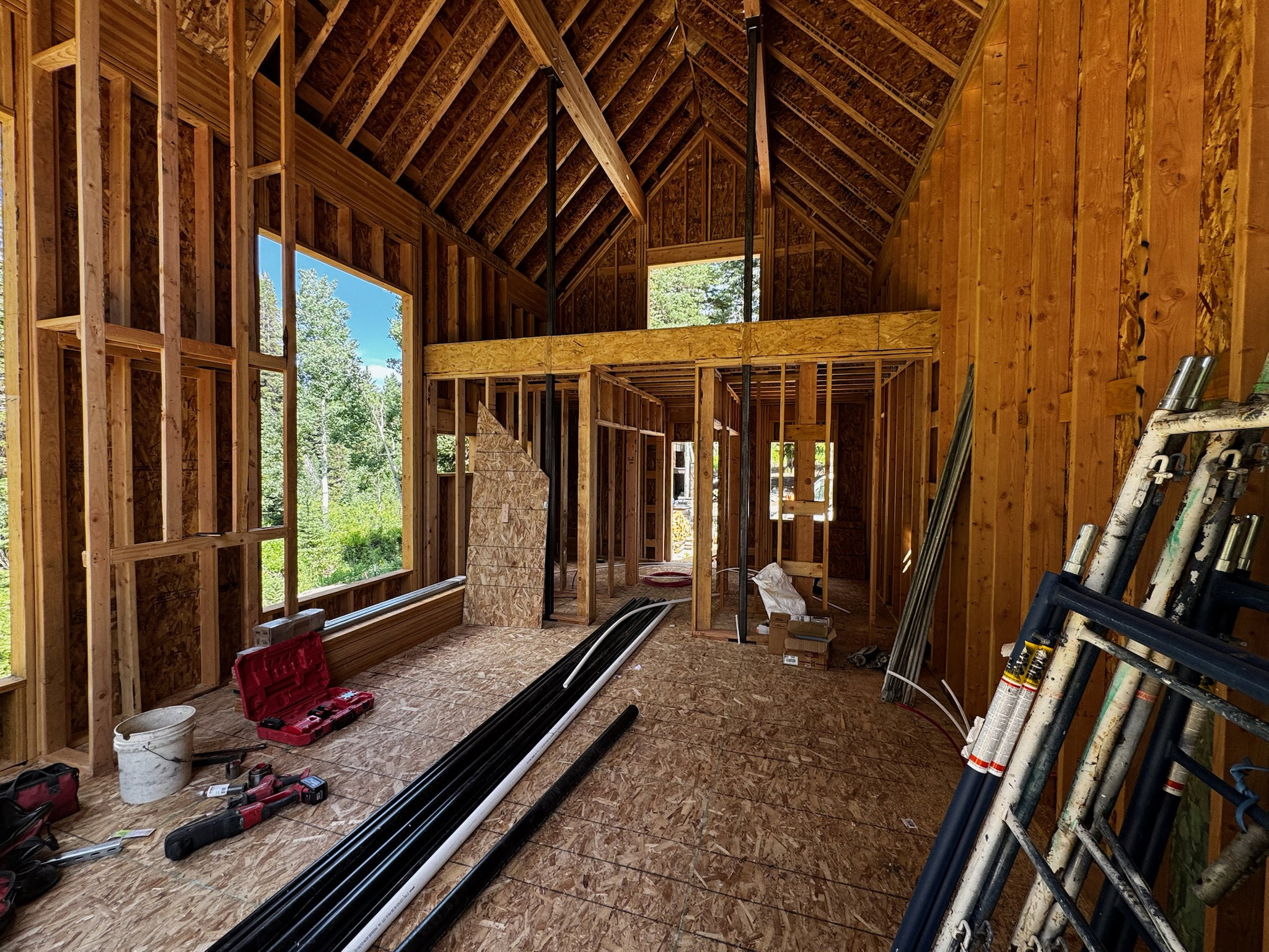 Quality craftsmanship underway - showcasing the impressive vaulted framing and signature A-frame structure.