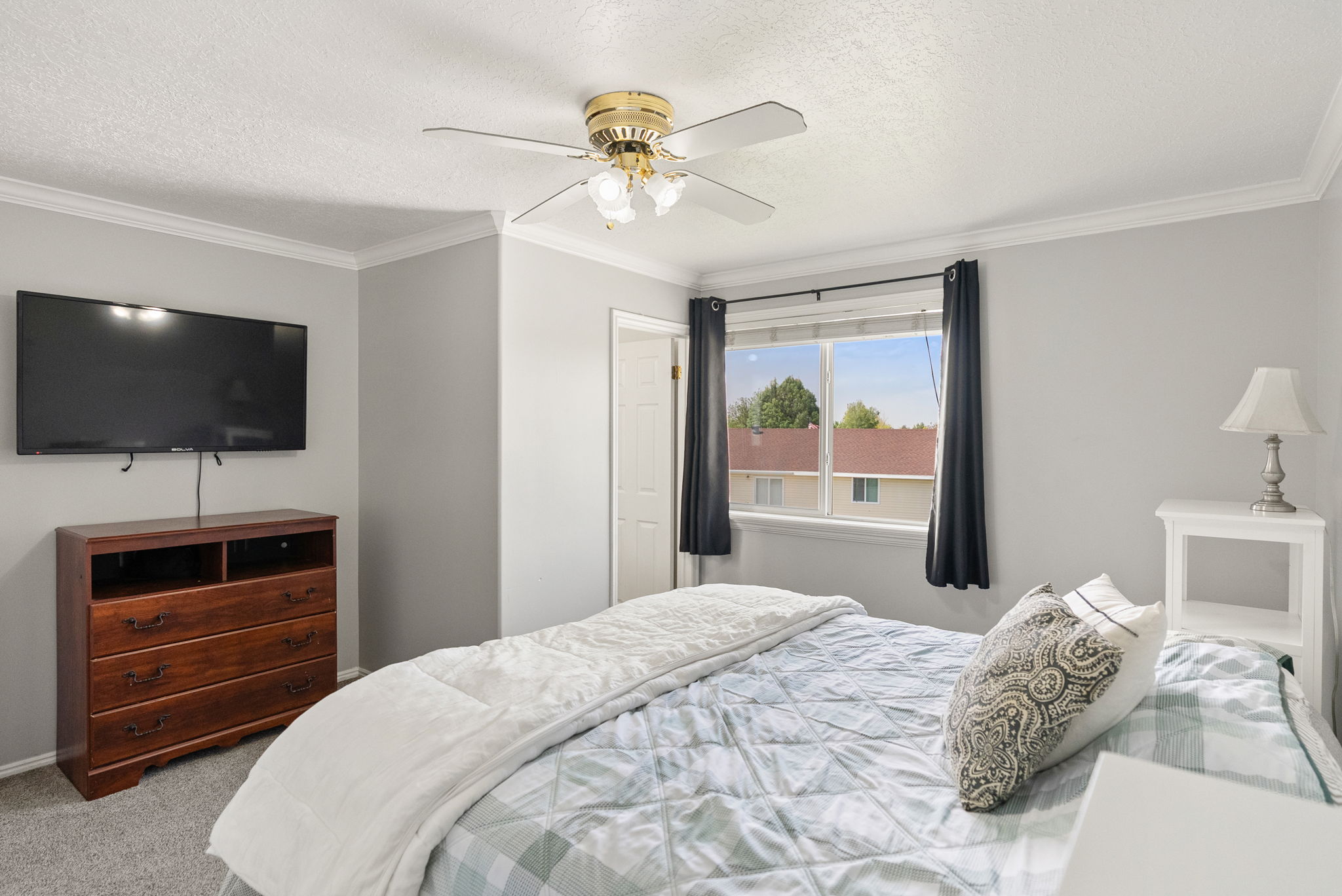 Light gray walls with white crown molding