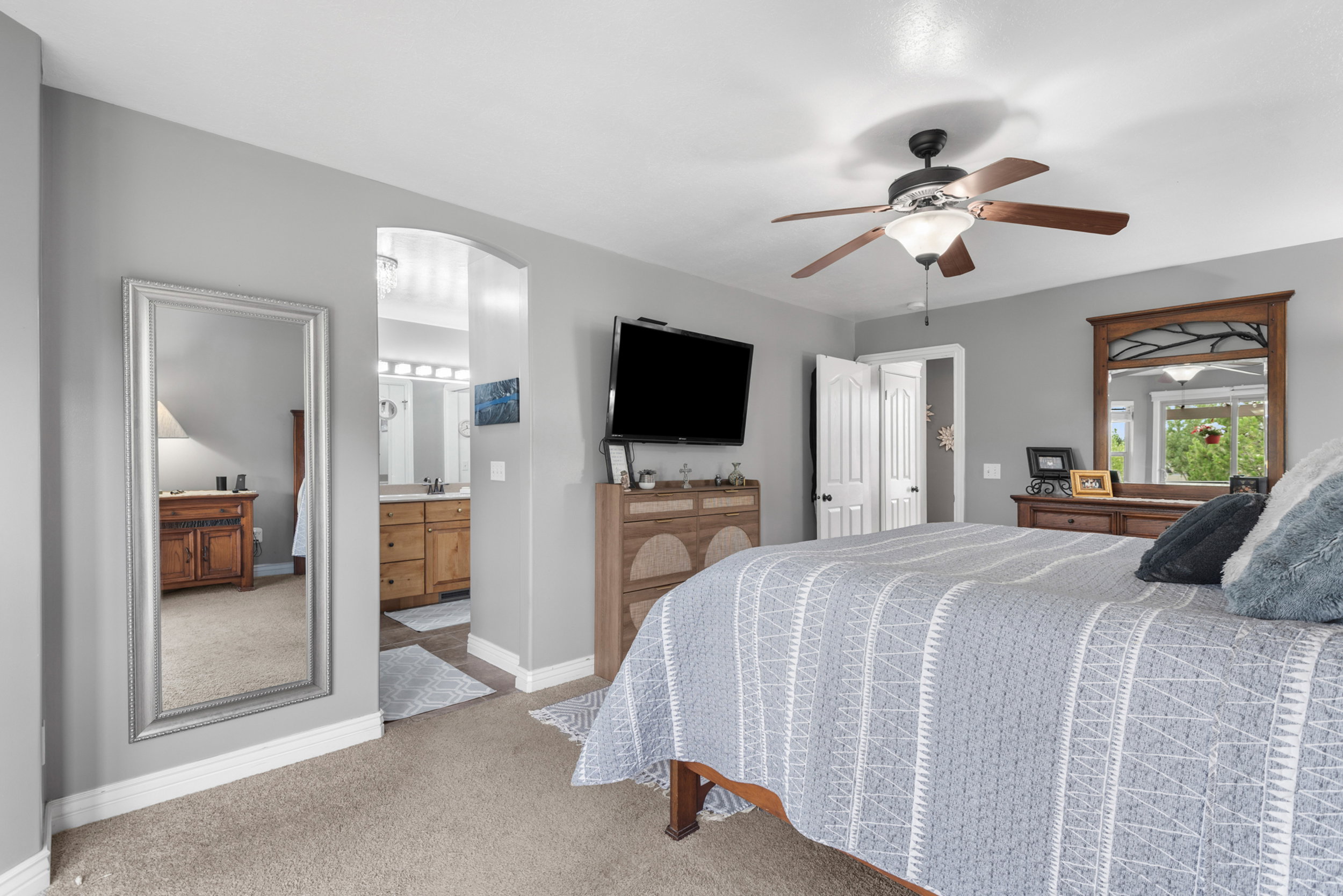 Primary bedroom with attached bathroom