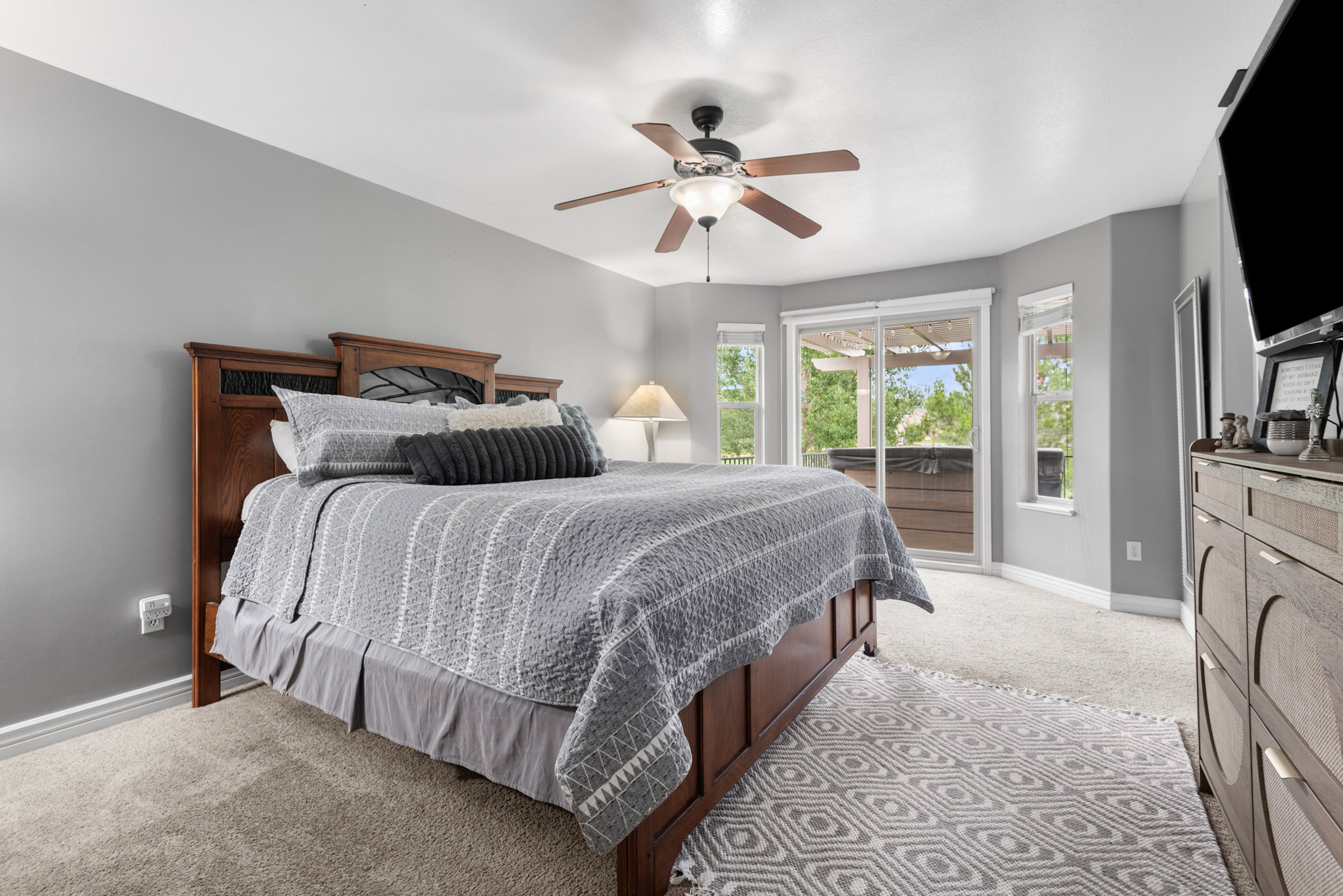Primary bedroom with walkout to deck/hot tub.