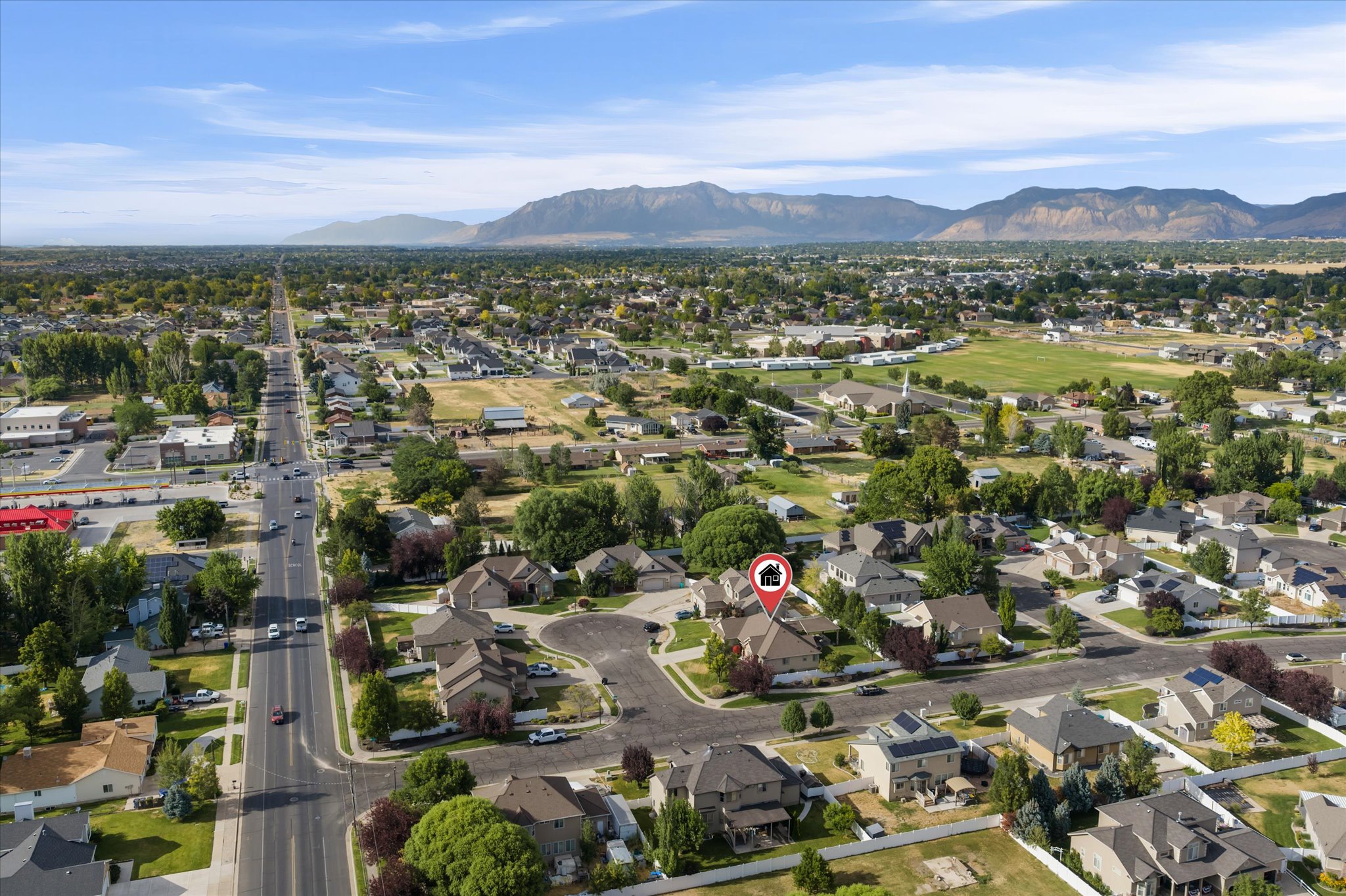 Aerial perspective showcasing a residential area with a prominent cul-de-sac