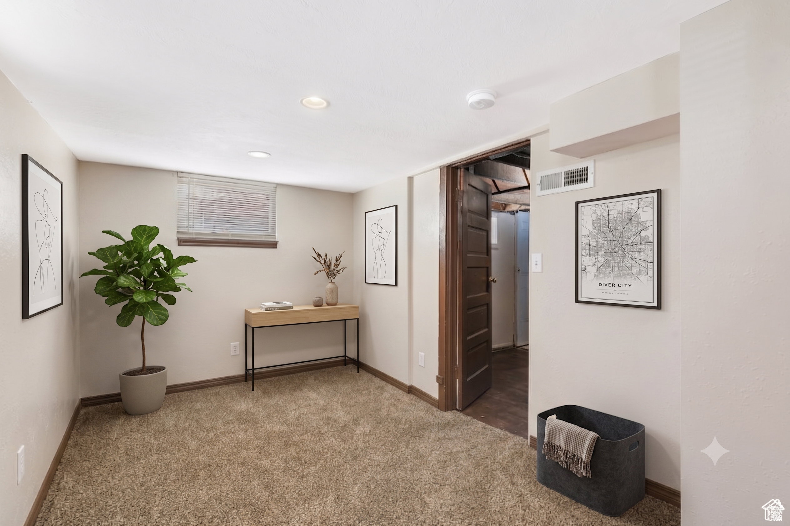 Carpeted room with recessed lighting and a single window featuring blinds