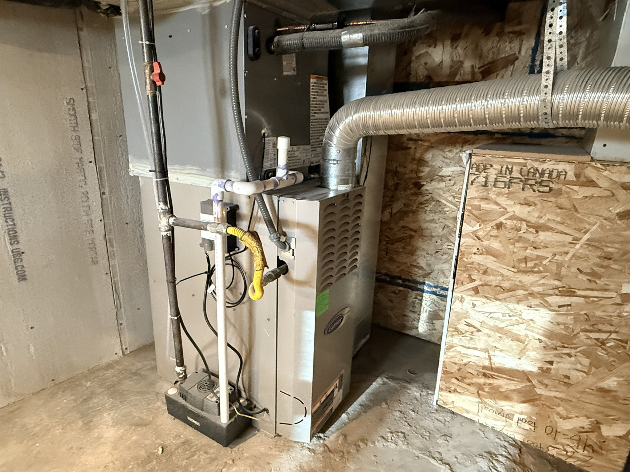Furnace and ductwork installation with a sump pump system