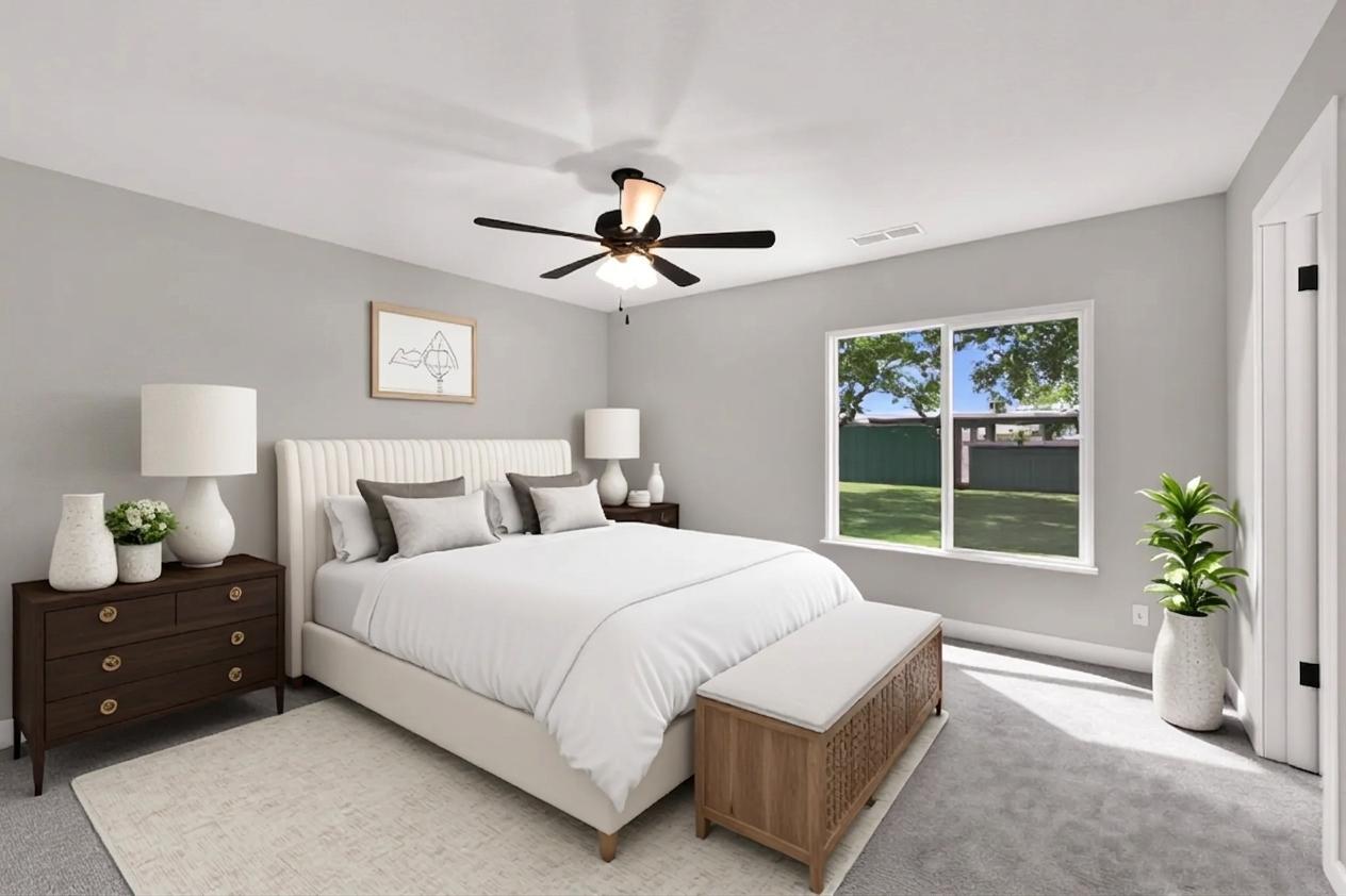 Light gray walls complement the gray carpeting