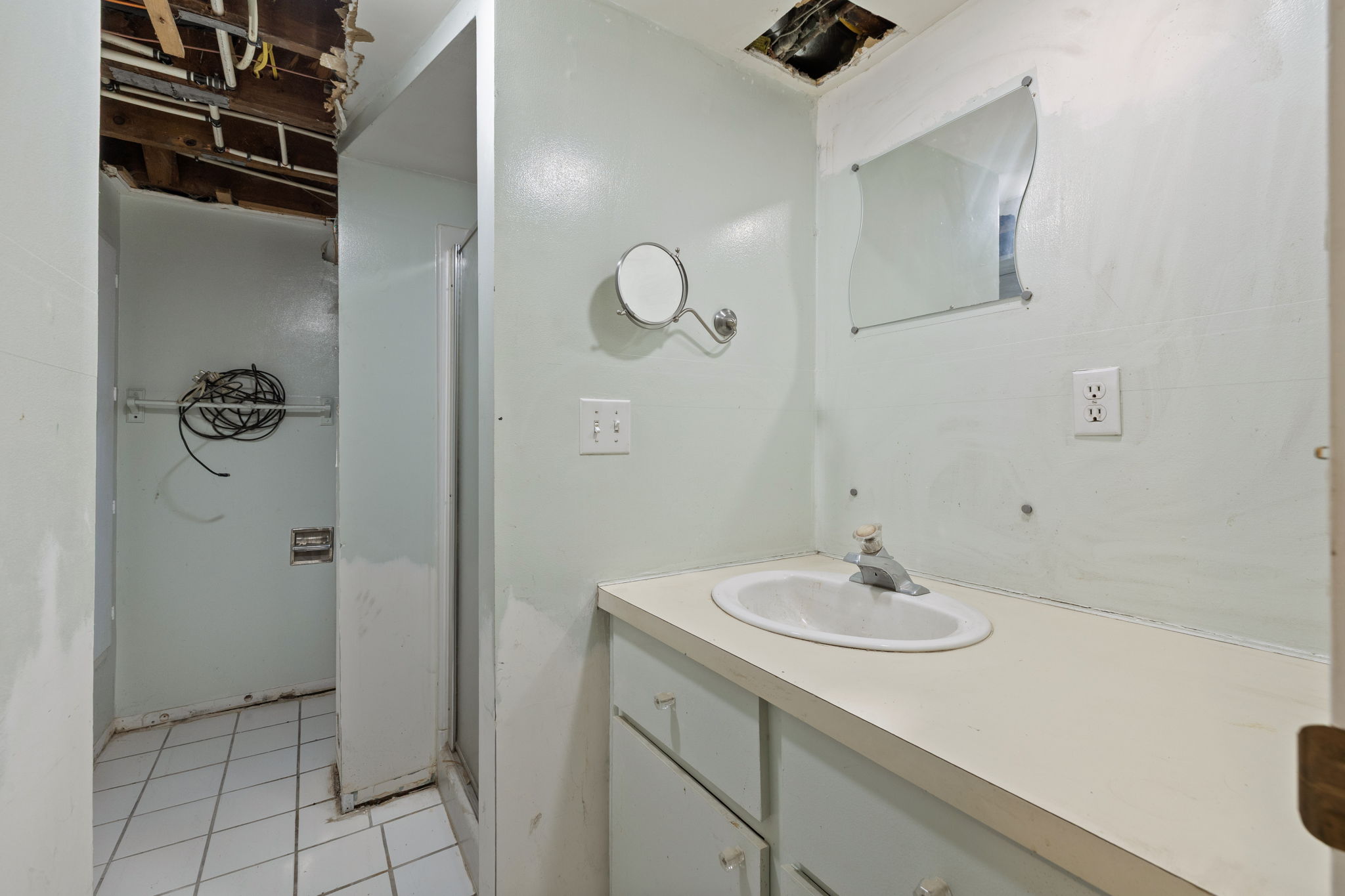 Bathroom vanity with integrated sink and chrome-finish faucet
