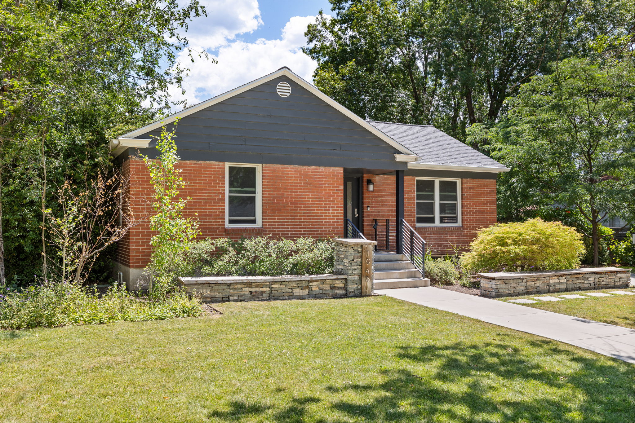 Brick facade with dark siding accents