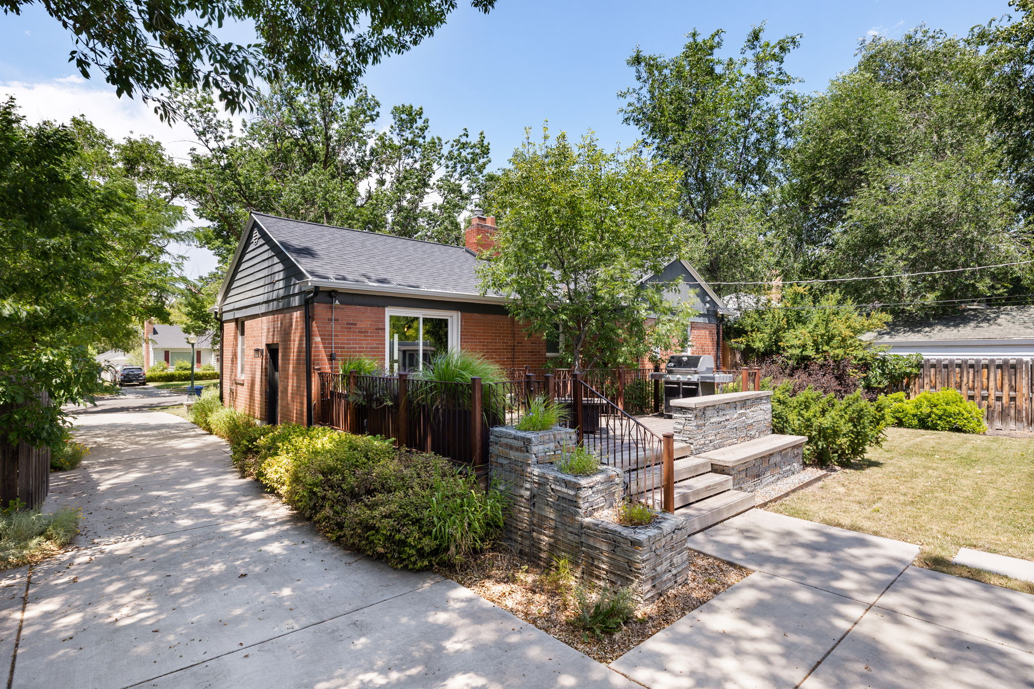 Brick exterior with dark siding accents