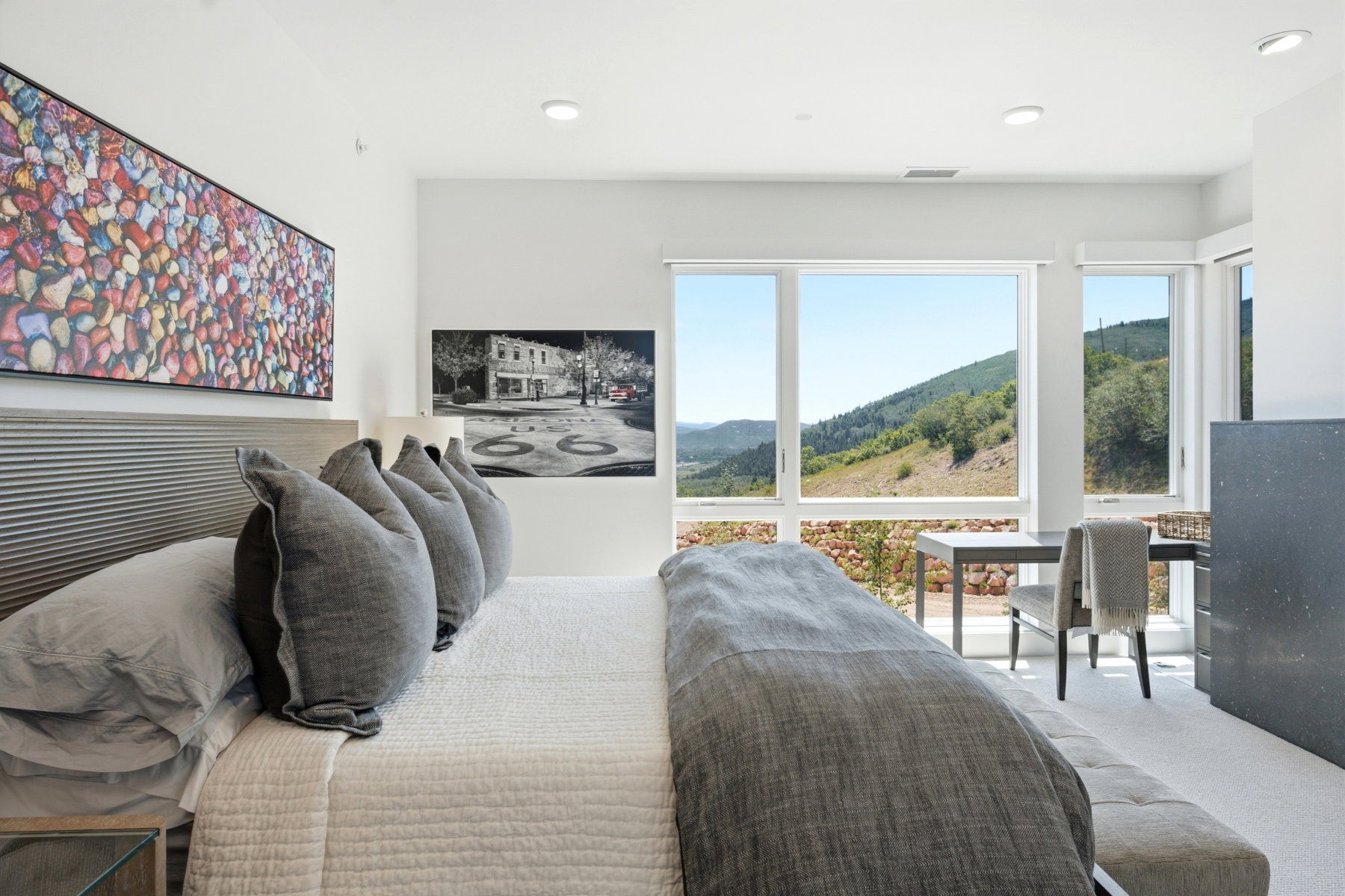 Expansive window wall offering mountain scenery
