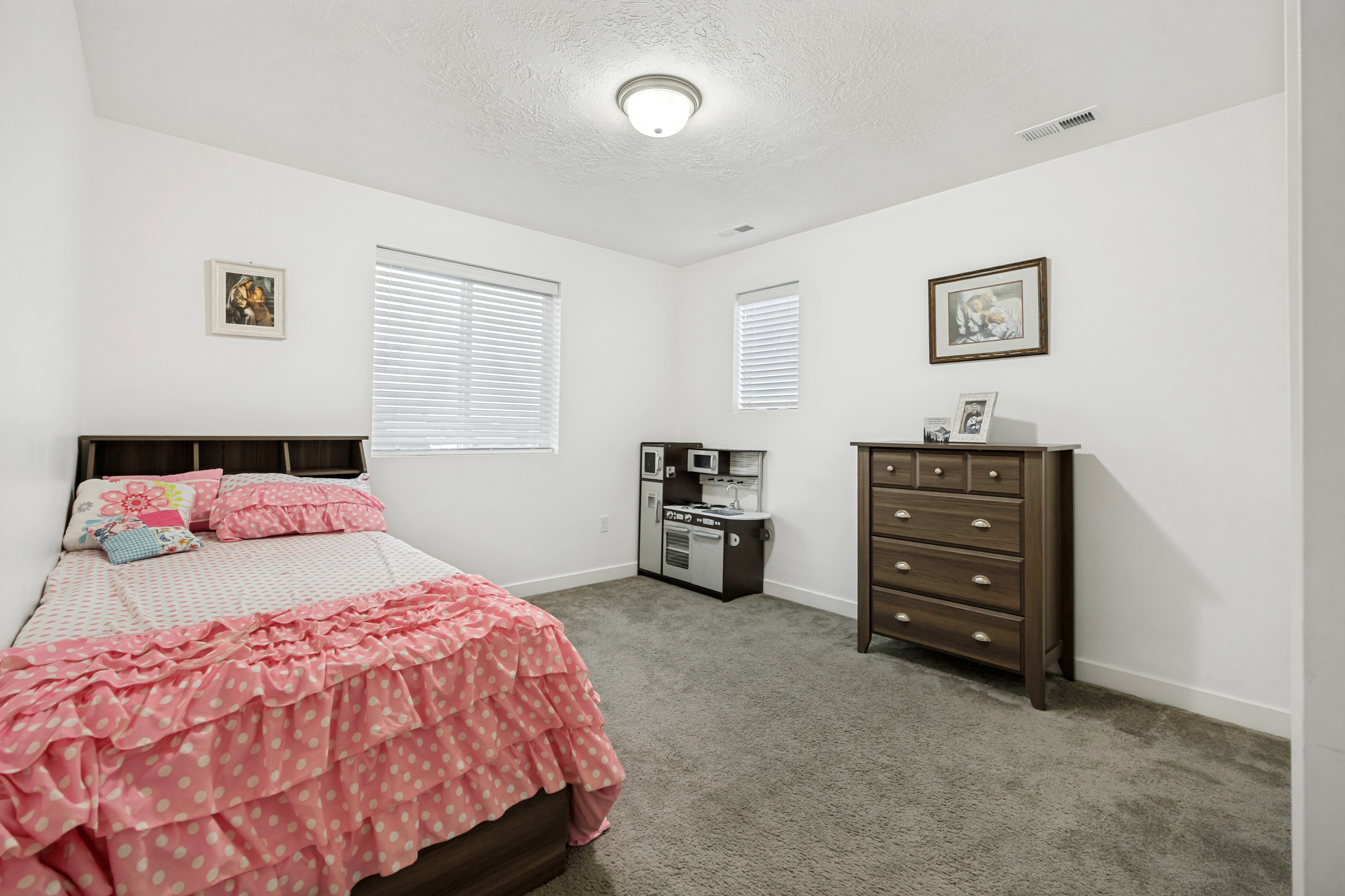 Room featuring neutral wall finishes and carpet flooring