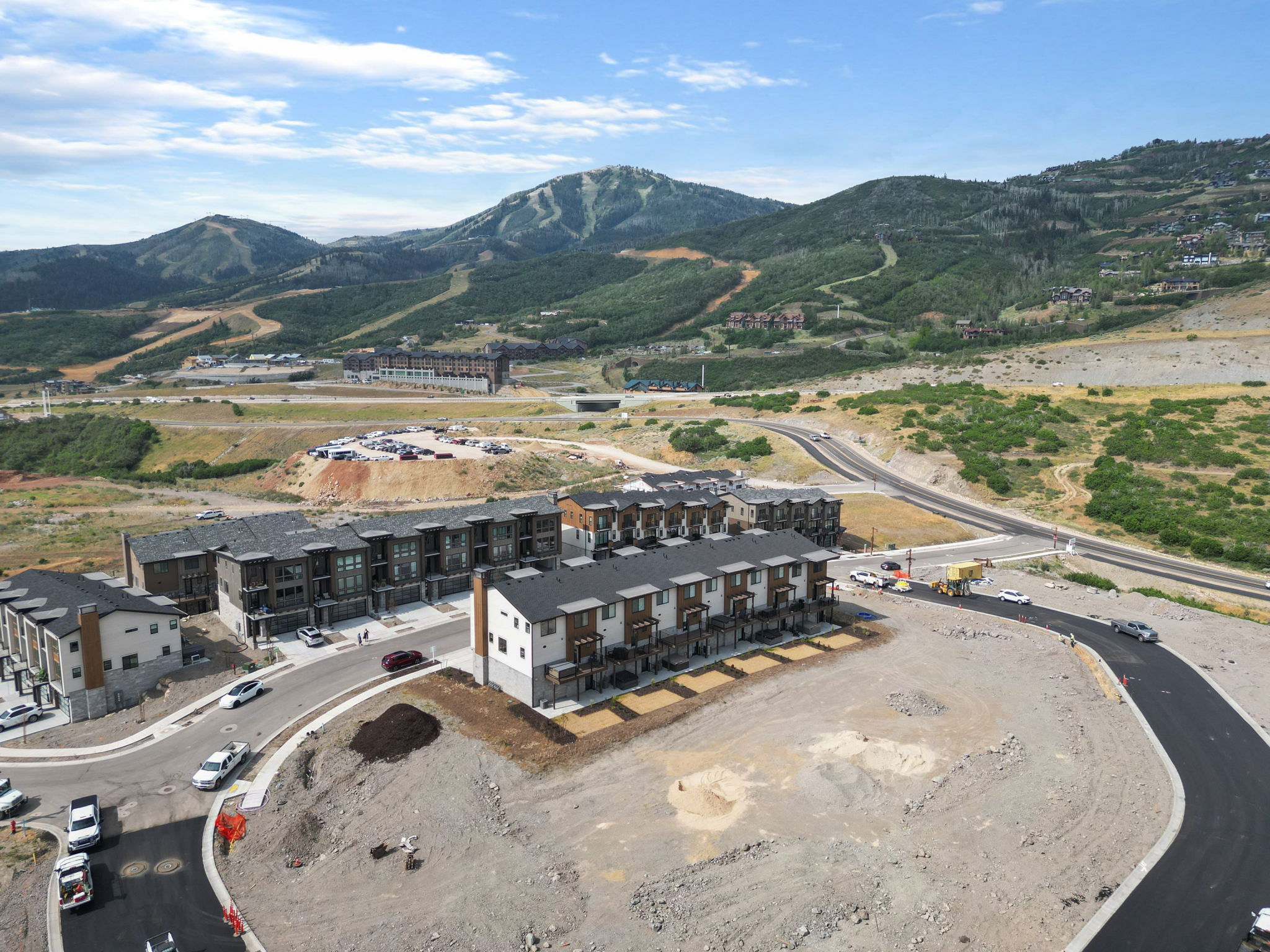 Contemporary townhome community with mountain backdrop