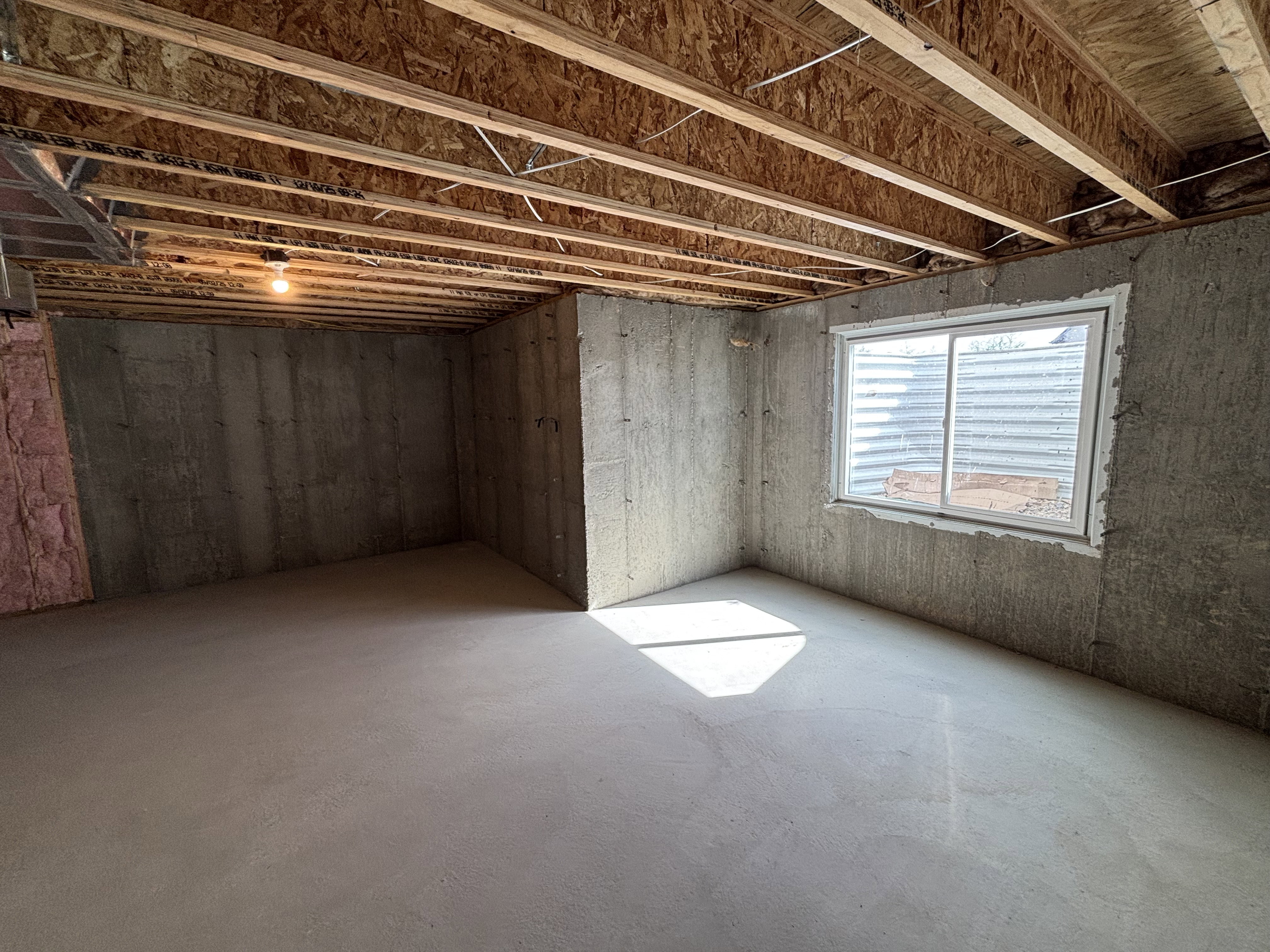 Unfinished basement, potential bedroom