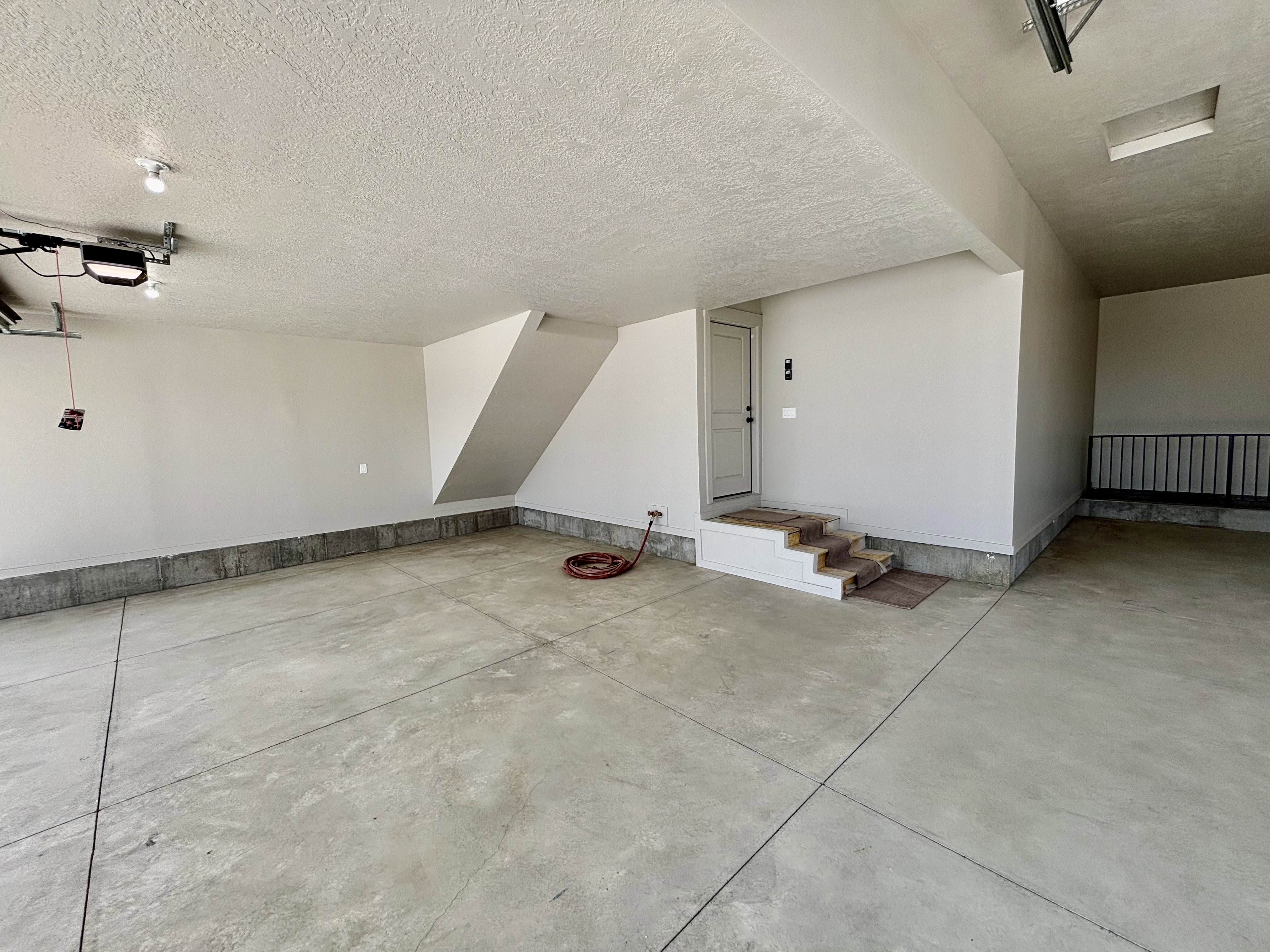 Spacious garage, fully finished walls and ceiling