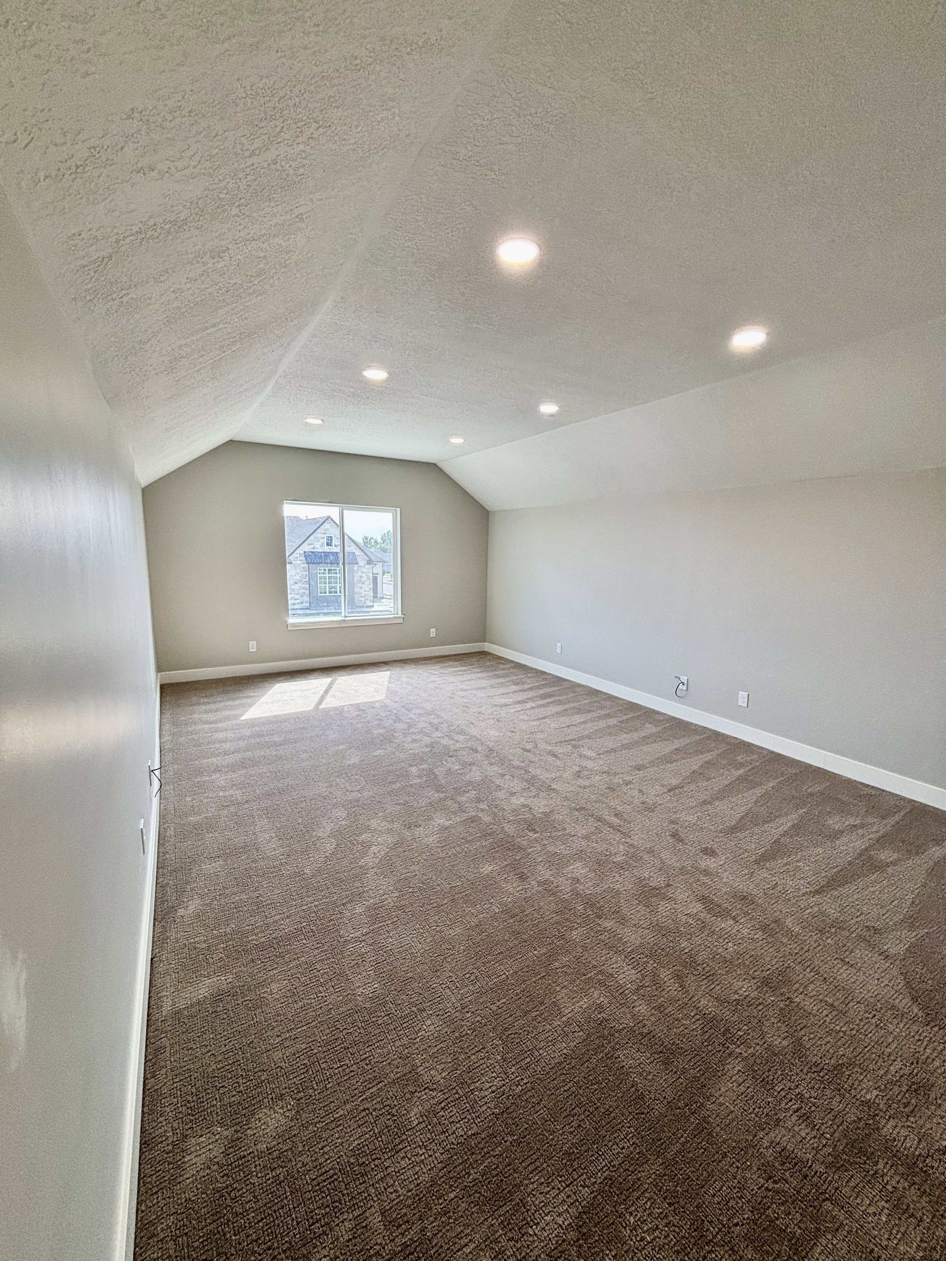 Spacious bonus above the garage