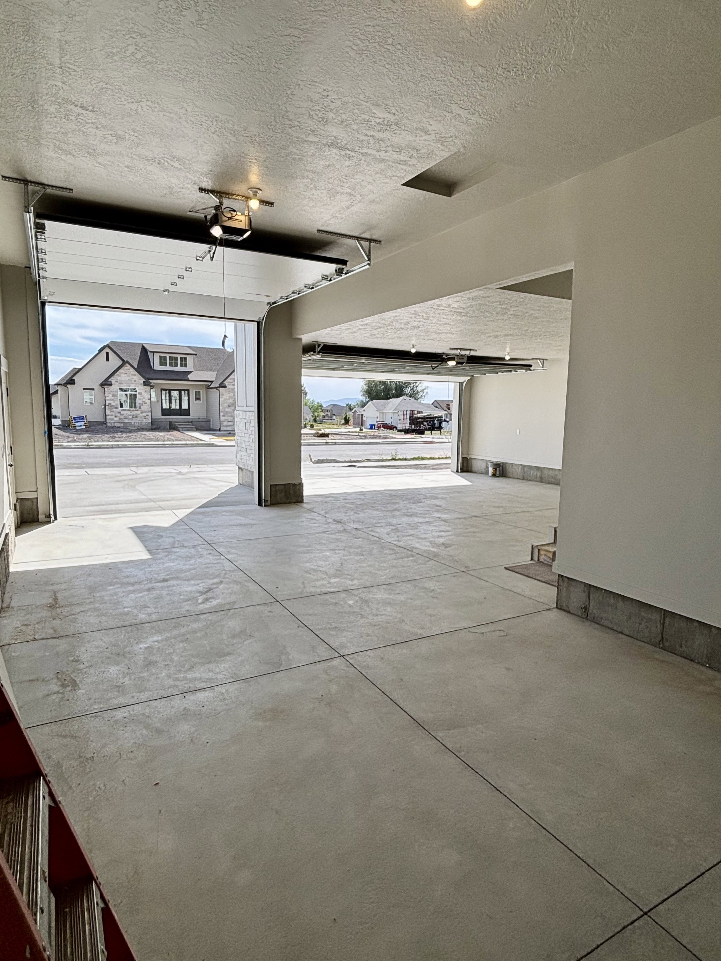 Two-bay garage and fully finished walls/ceiling