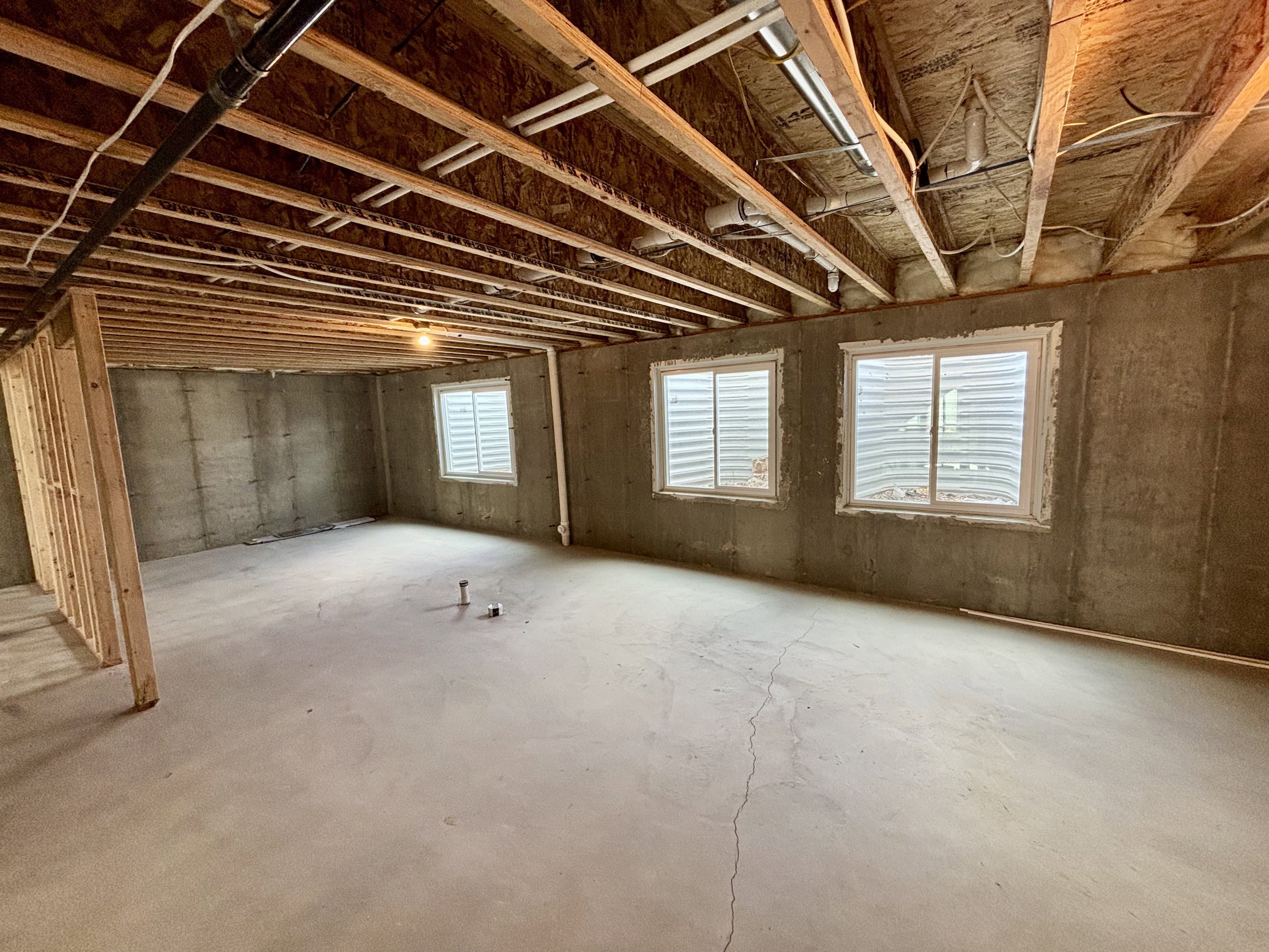 Unfinished basement, potential bedroom