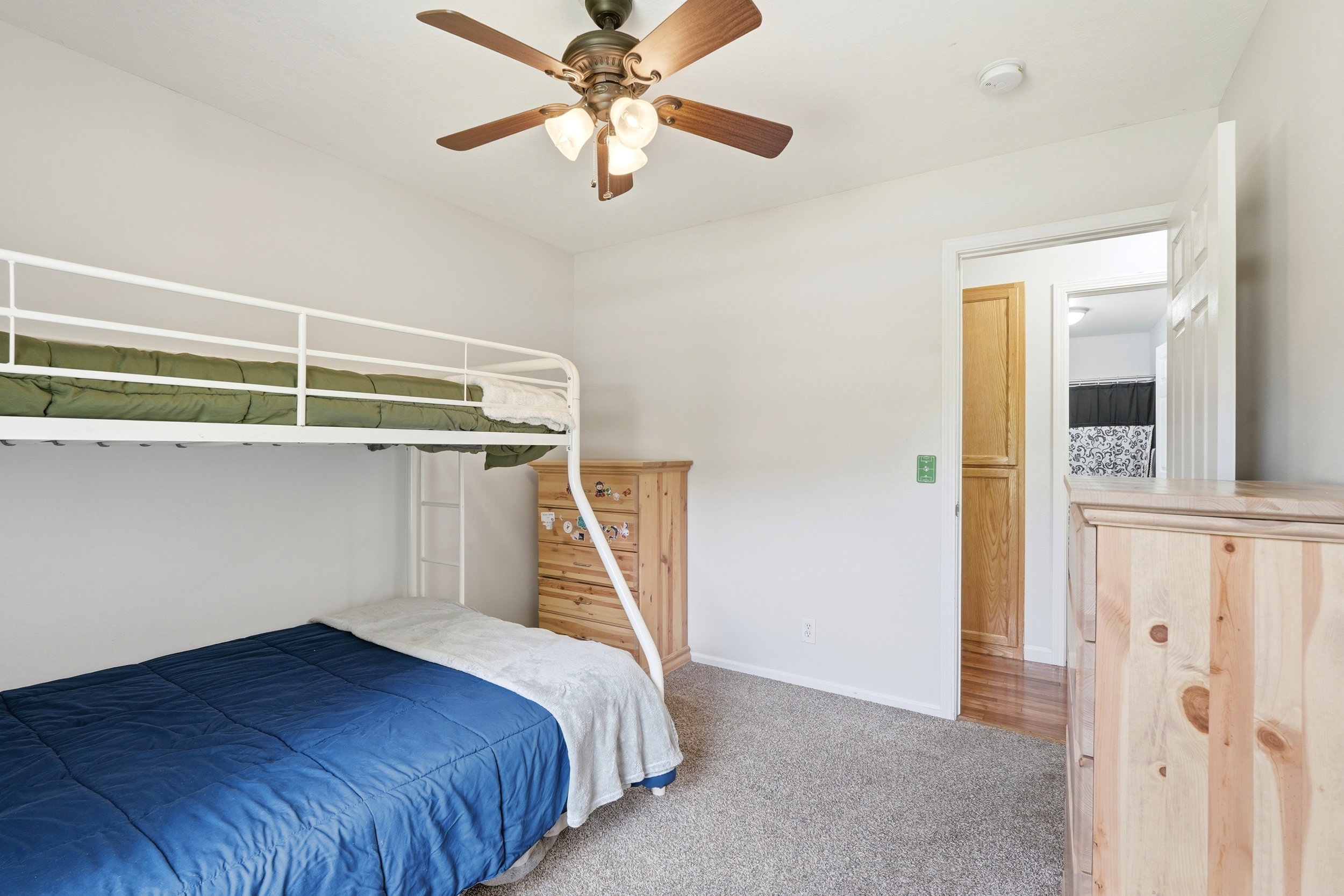 Light-colored walls with carpet flooring