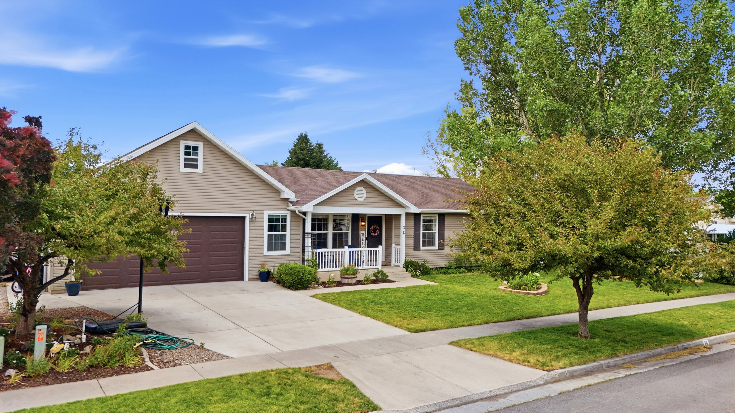 Siding exterior with an attached two-car garage