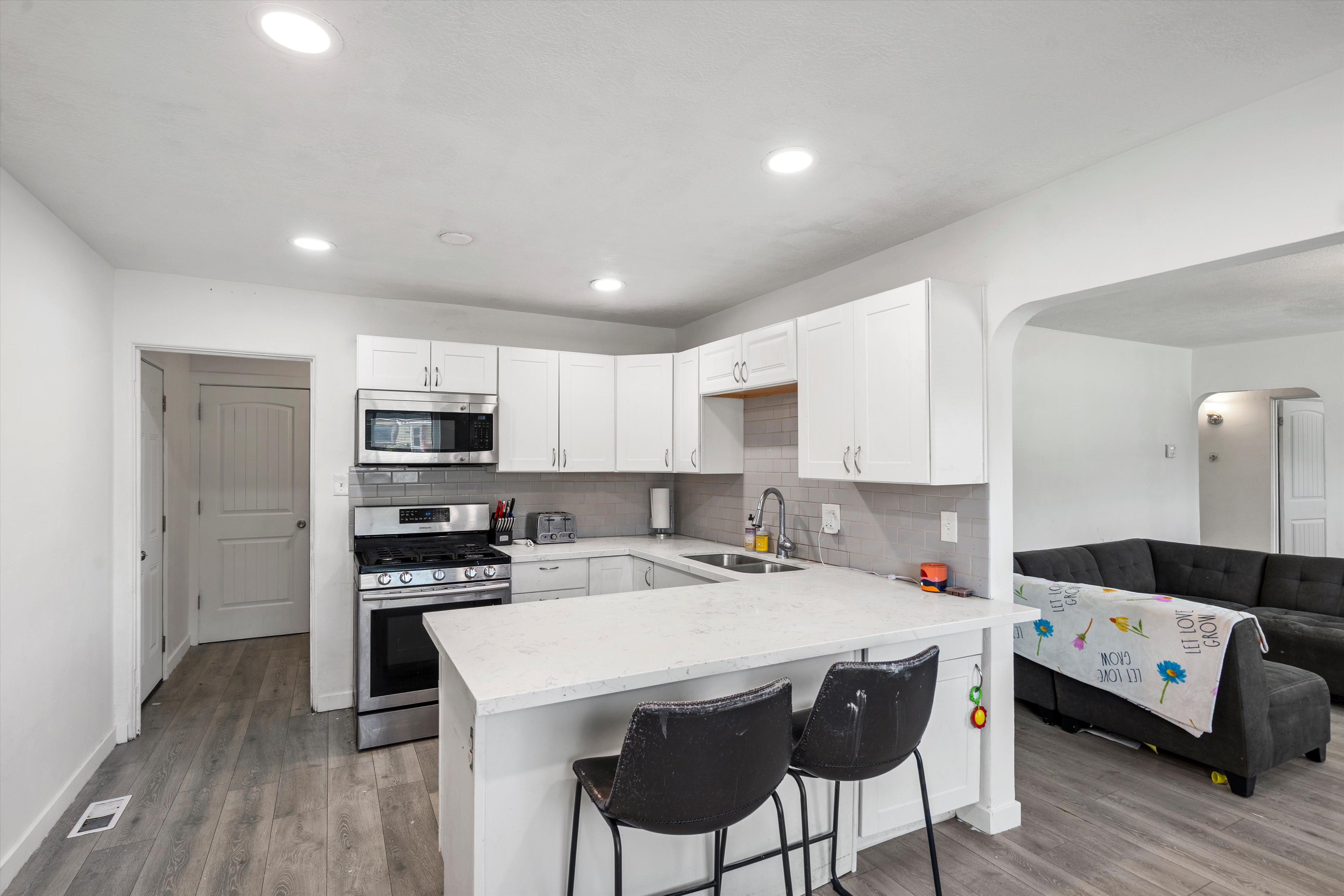 Modern and updated kitchen, living room