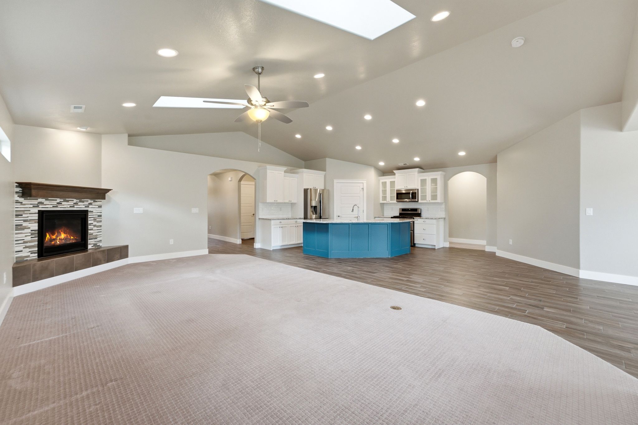 Vaulted ceiling with skylights and recessed lighting
