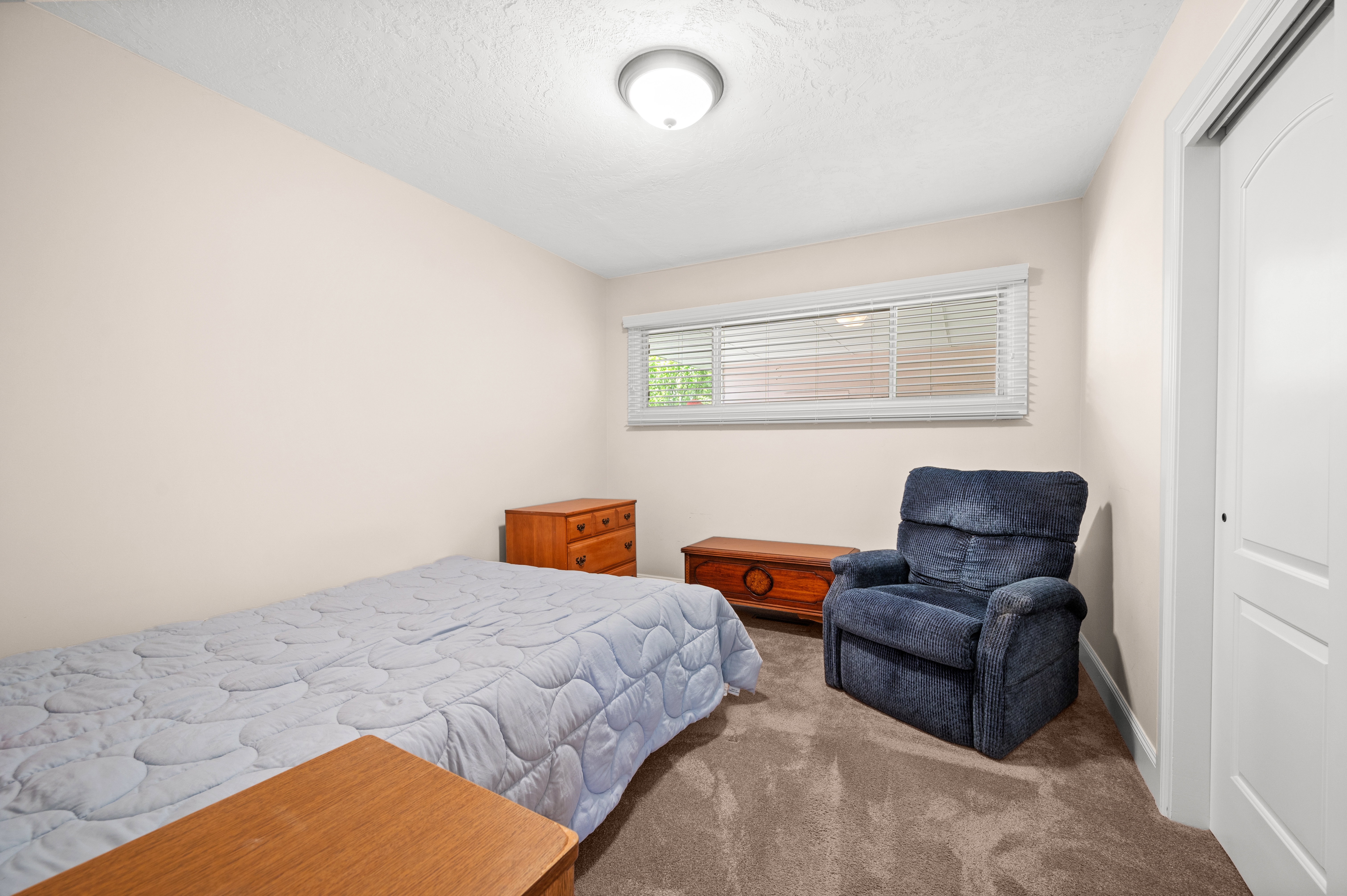 Whether used as a bedroom, home office, or creative space, this room offers endless possibilities.