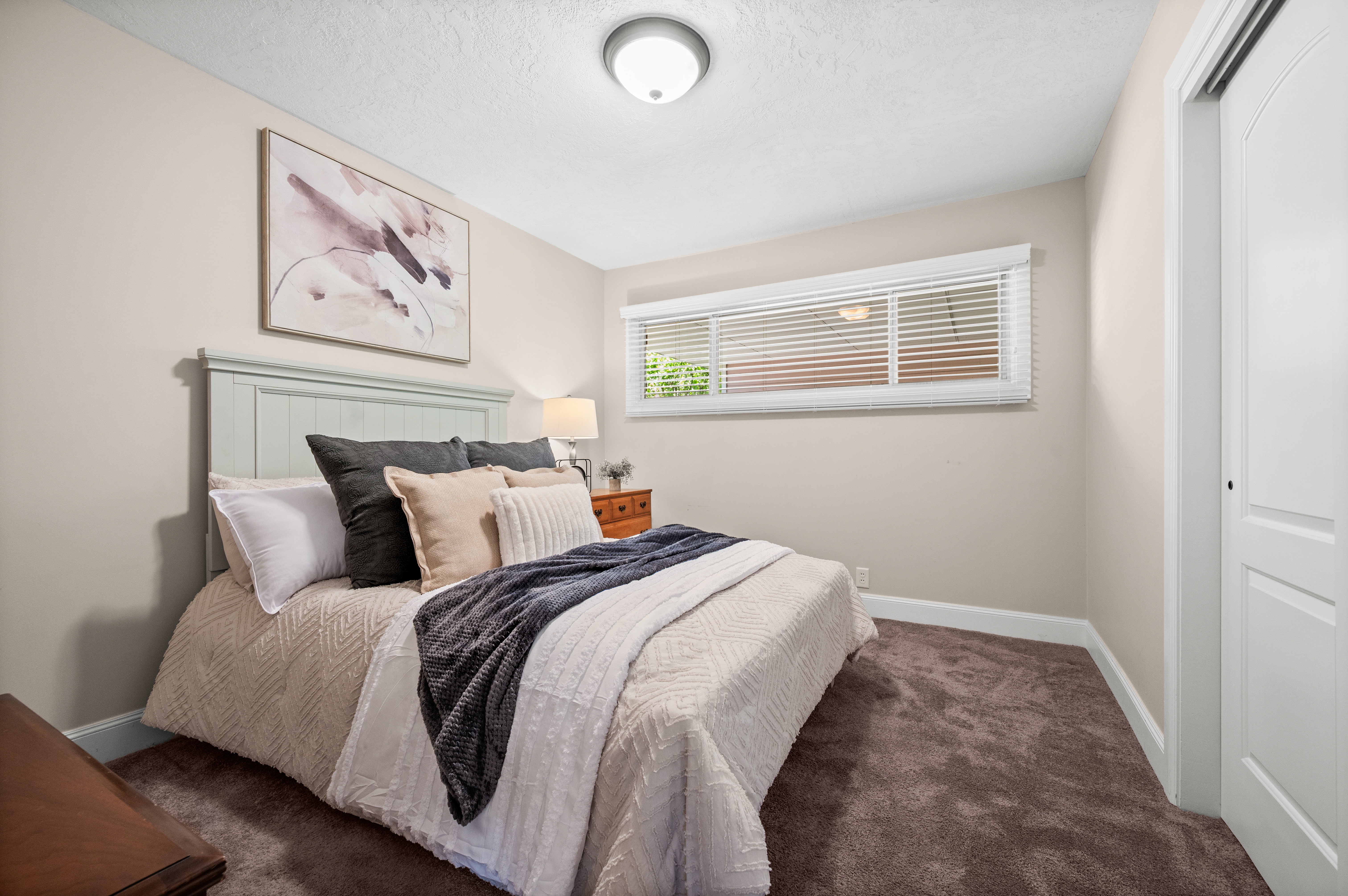 Whether used as a bedroom, home office, or creative space, this room offers endless possibilities.