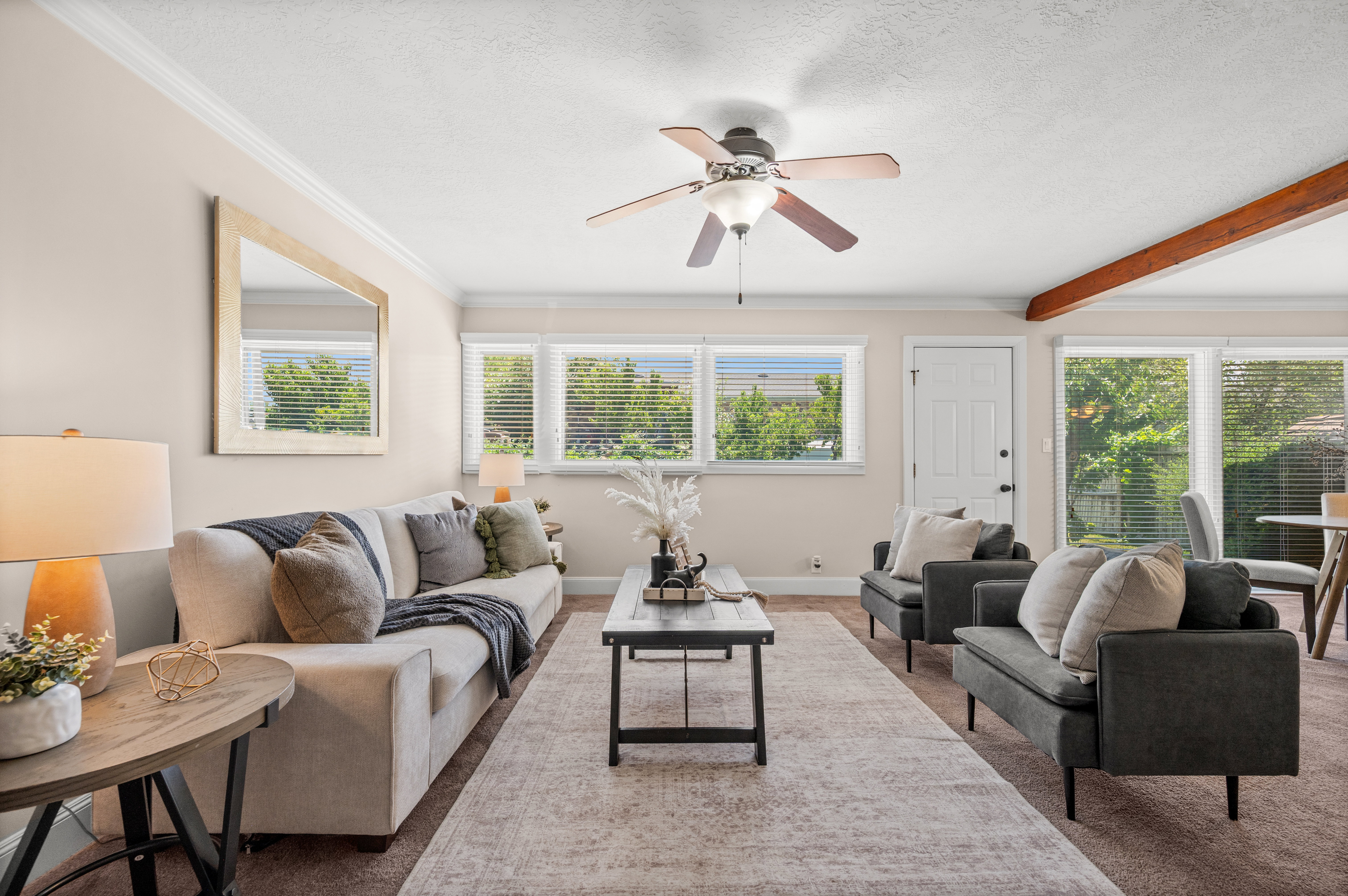 Whether it's movie nights, holiday gatherings, or quiet evenings by the fire, this spacious family room is designed to bring family and friends together and create memories for years to come.