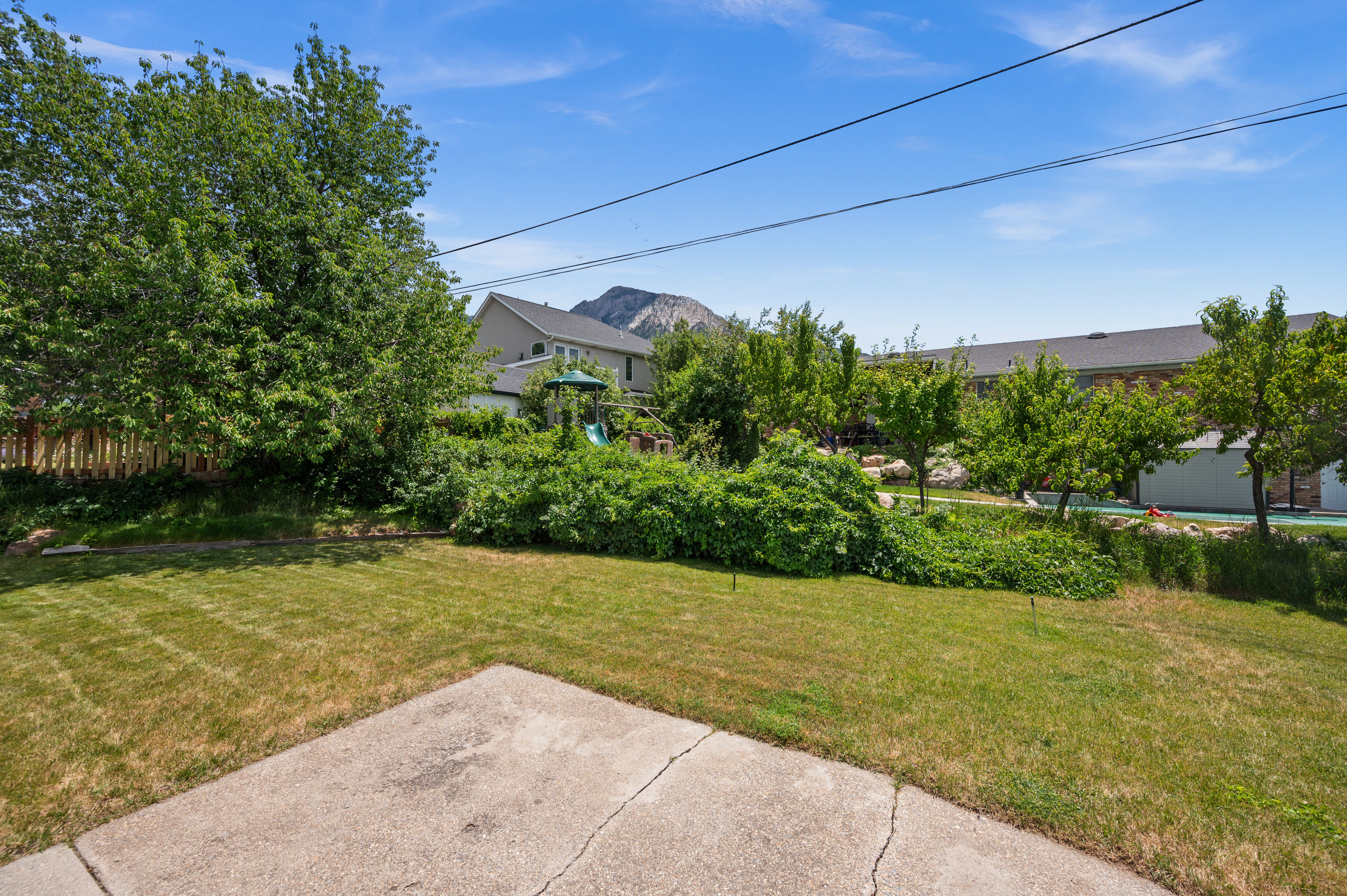 Step outside and experience a backyard where natural beauty and peaceful views come together.