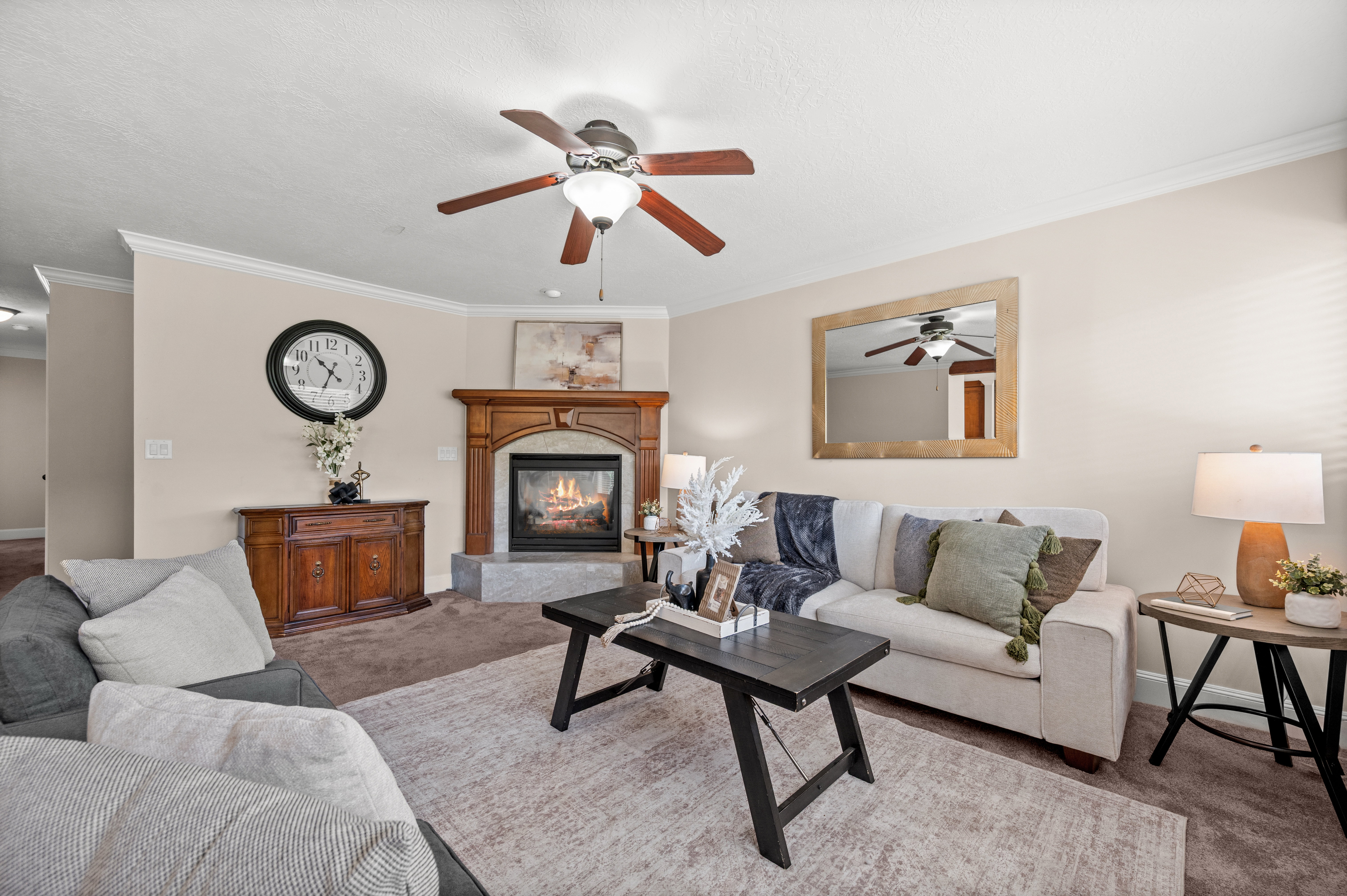 The gas fireplace creates a warm focal point, making this large family room the perfect place to gather year-round.