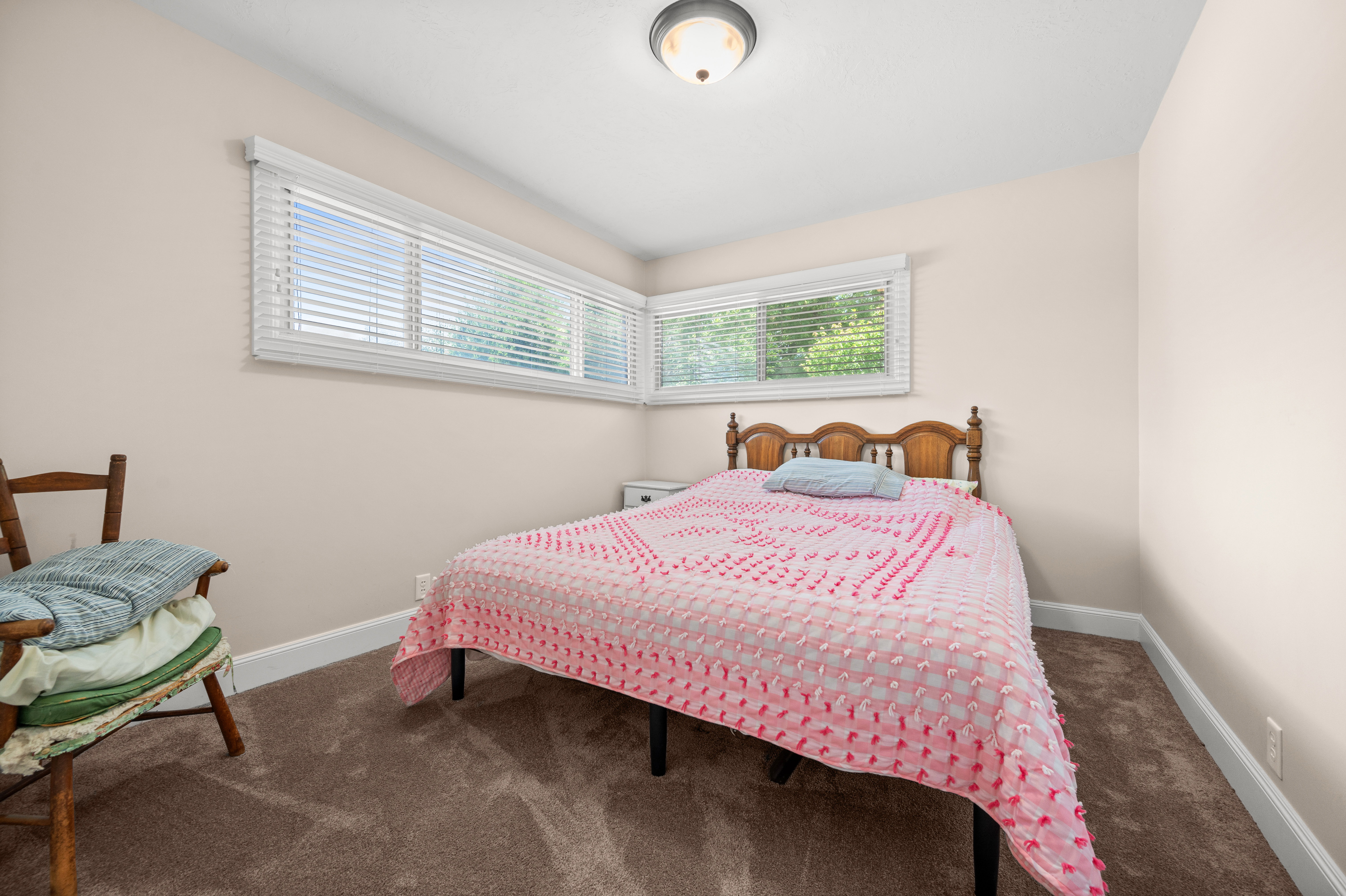 Comfort and simplicity come together in this inviting bedroom.